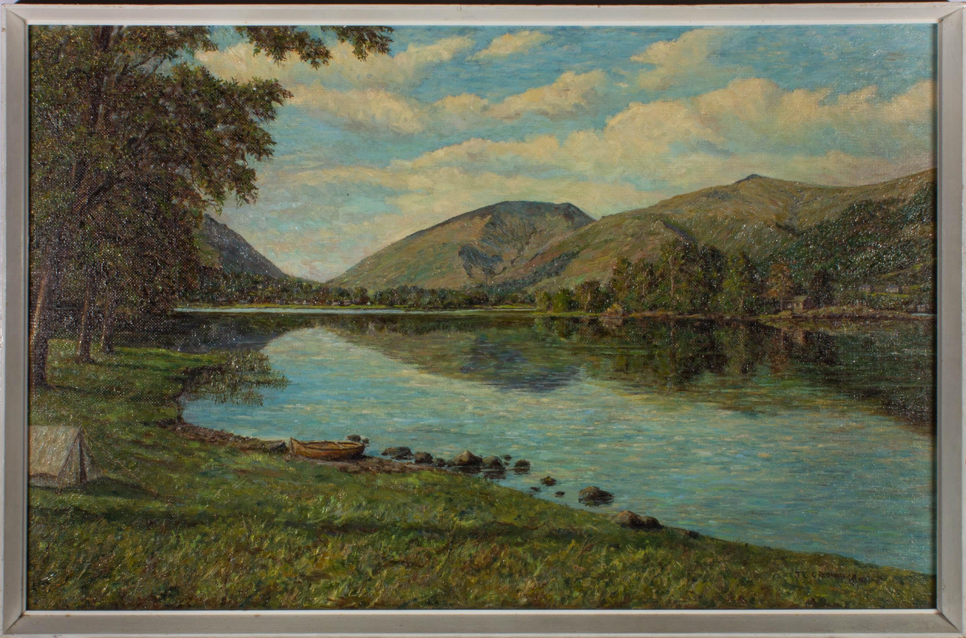 A Lake District scene depicting the view across Grasmere lake towards Helvellyn. Presented in a white painted wooden frame. Signed to the lower-right edge. Artist's label on the verso that includes the location. On board.
