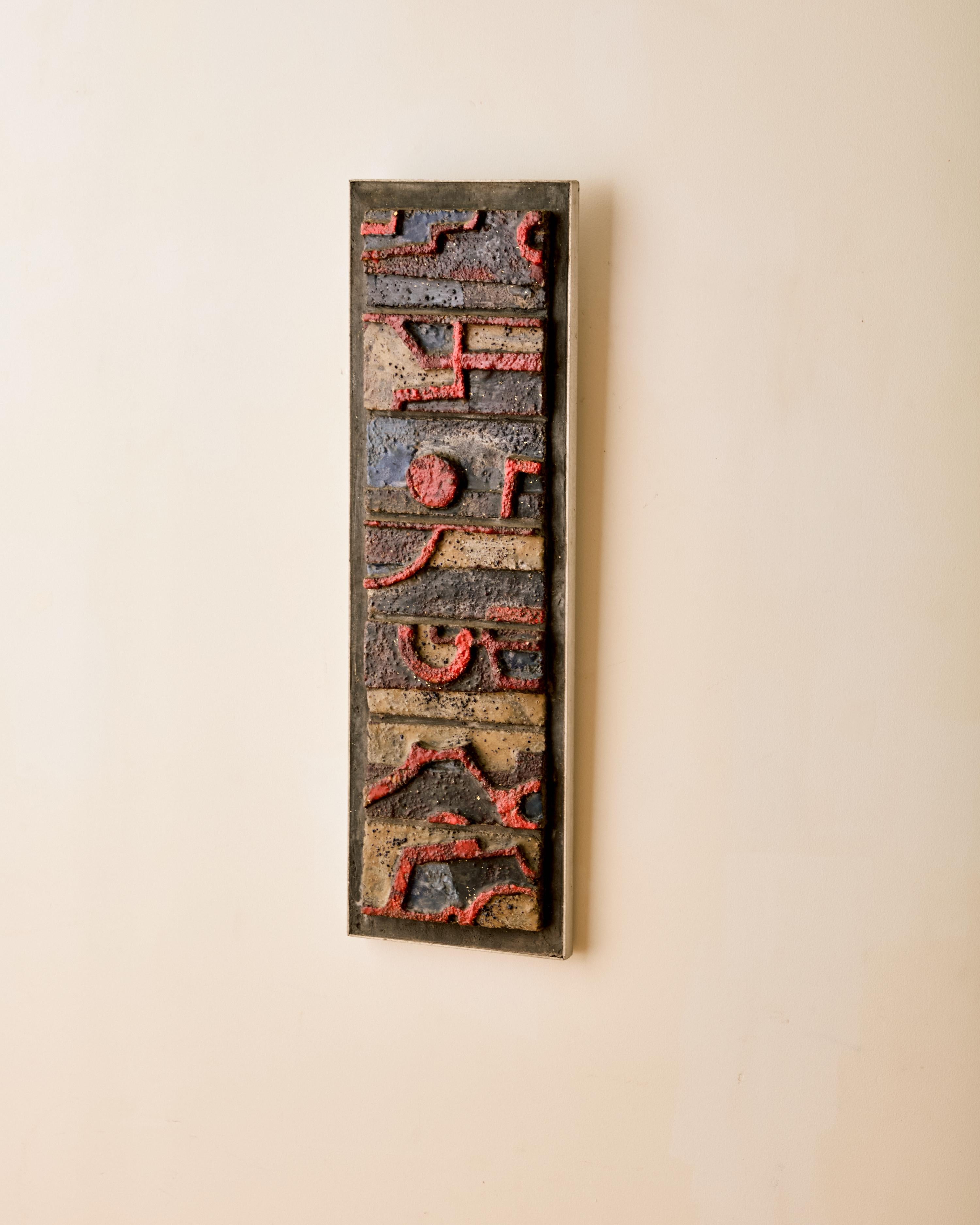 J.C. Menihan untitled carved brick wall hanging sculpture, dated on verso. 

John C. Menihan was a lithographer and painter/muralist who studied with master lithographer Bolton Brown at his studio in Zena, New York. In the late 1930s, Menihan