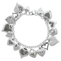 JCM Herz-Charm-Armband aus poliertem und strukturiertem Sterlingsilber