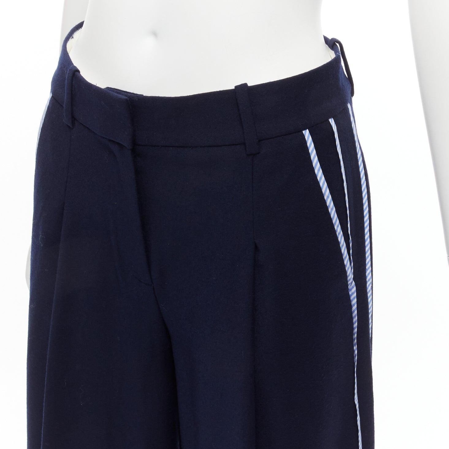 J.CREW Net-a-porter navy wool blend side stripe trim pleat front wide trousers US0 XS
Reference: SNKO/A00410
Brand: J.Crew
Collection: Net-a-porter
Material: Wool, Blend
Color: Navy, Multicolour
Pattern: Pinstriped
Closure: Zip Fly
Lining: White