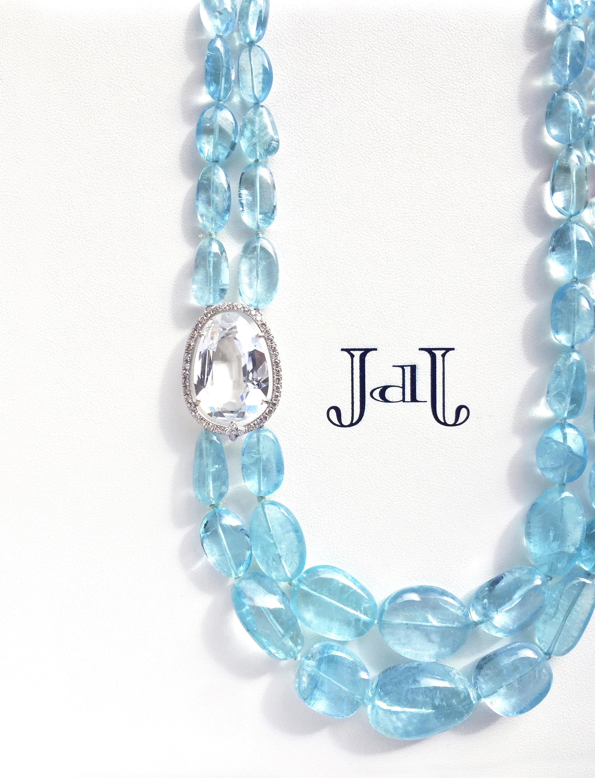 JdJ Couture - One of a kind  ( editorial caption for style ) Carved graduated Aquamarine Beads weighing approximately 400ctw double strand necklace with spectacular antique mixed cut cushion /pear shaped White Tourmaline weighing 17.13ct and faceted