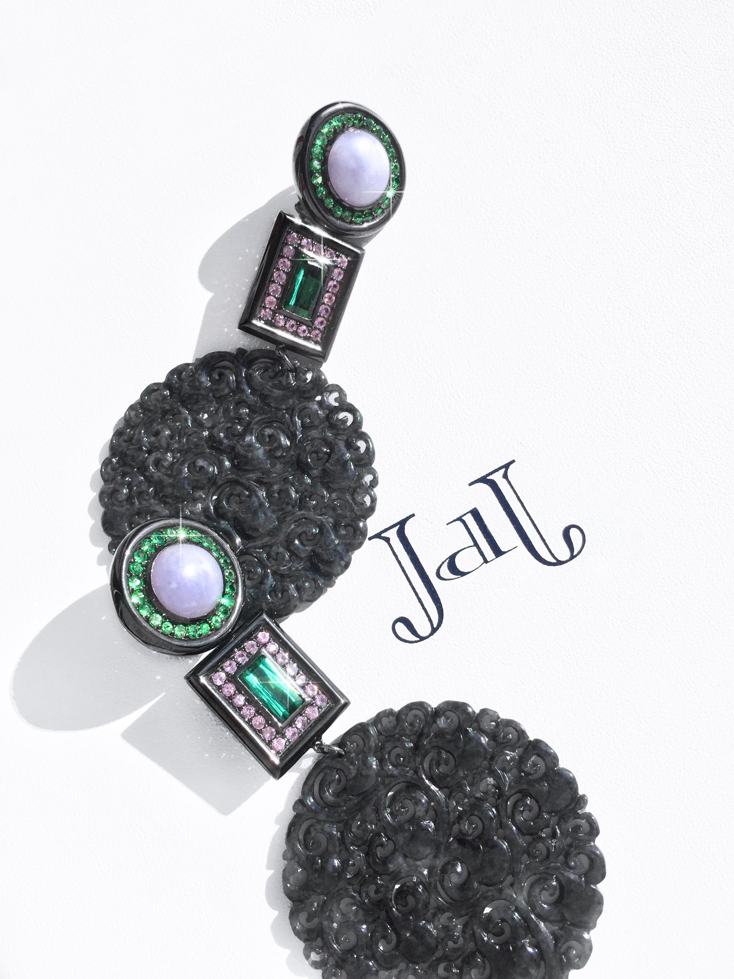 Hand carved natural untreated black  and  lavender jade earrings accented with tsavorite garnet and pink sapphires set in 18k white gold with a black rhodium . 