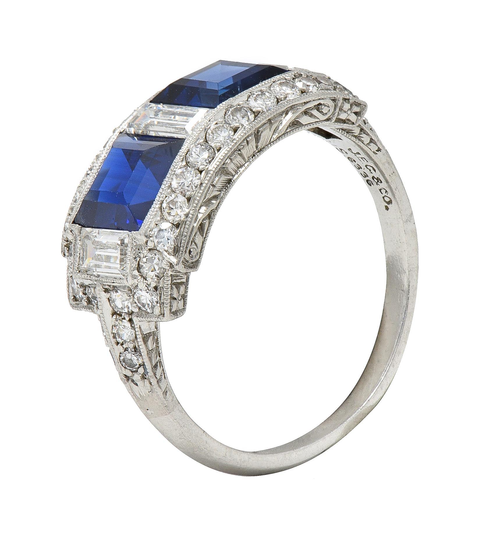 Featuring two square step-cut sapphires weighing approximately 1.74 carats total - transparent medium blue in color
Natural Cambodian in origin with no indications of heat treatment - channel set 
Alternating with baguette cut diamonds weighing