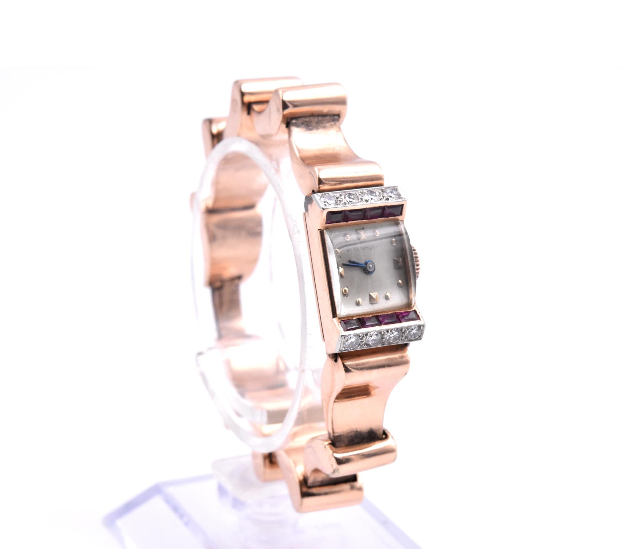 Movement: 17 jewel swiss manual wind movement
Function: hours, minutes
Case: 12.60mm x 20.90mm rectangular case set with rubies and diamonds, push/pull crown
Band: 14k rose gold wavy link bracelet
Dial: beige dial with gold square hour markers
Case