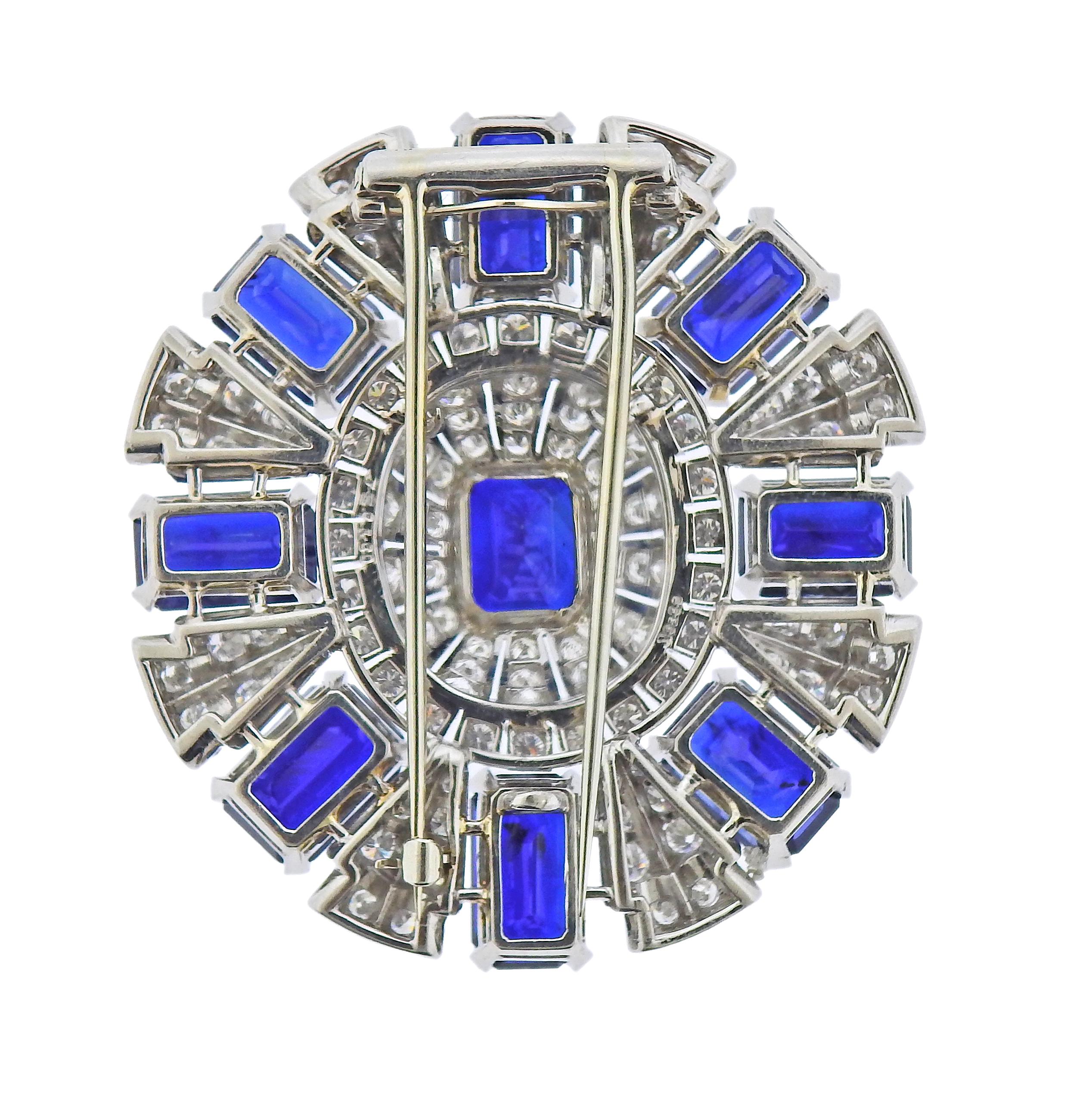 Art Deco platinum brooch by J.E. Caldwell & Co, set with 22.50ctw in sapphires and 4.30ctw in diamonds. Brooch is 1.75
