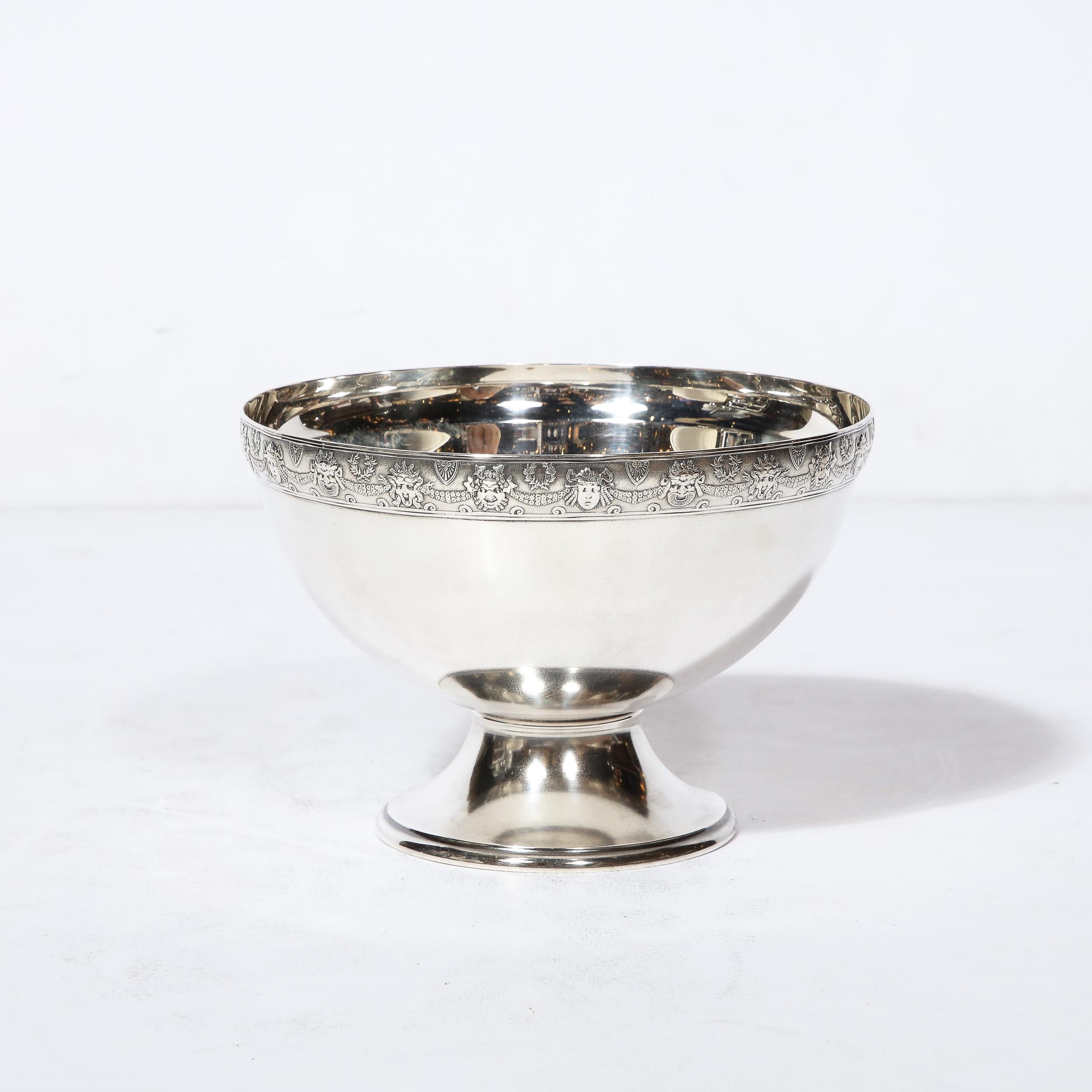 This exquisite  and highly sophisticated Art Deco Sterling Silver Serving Bowl was made by J.E. Caldwell and originates from the United States, Circa 1930. A truly special piece rendered in gleaming Sterling Silver, this bowl rests on a round