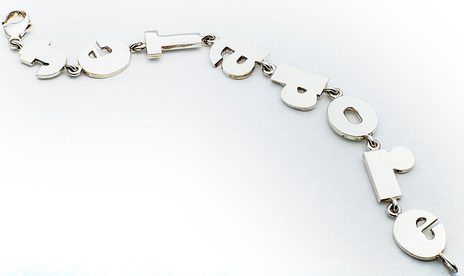 Saying Je T’Adore, translated from French to mean “I love you”, is sometimes just enough, and this sterling silver bracelet does just that. 7.25