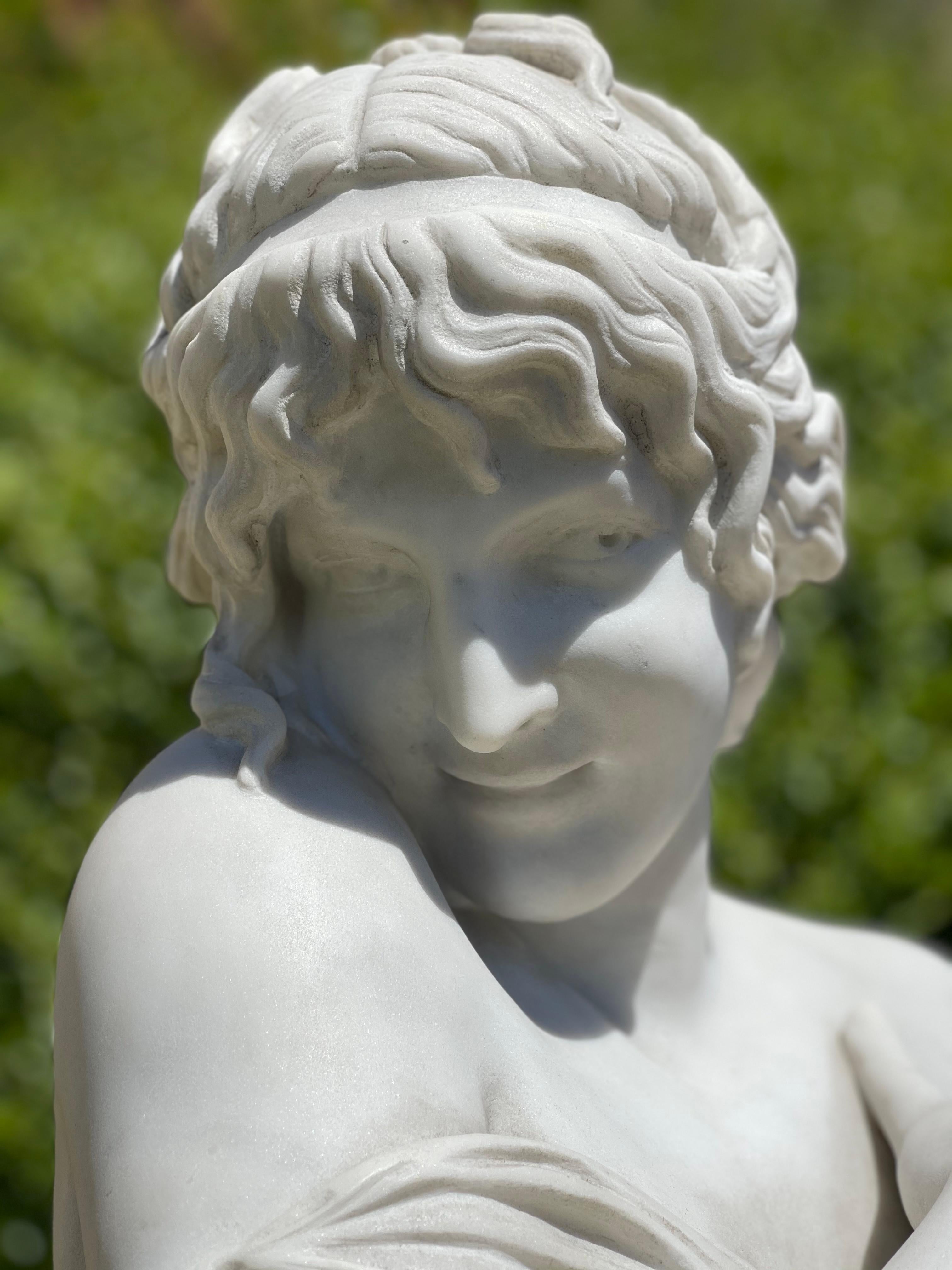 Bust of a naked young woman entitled 