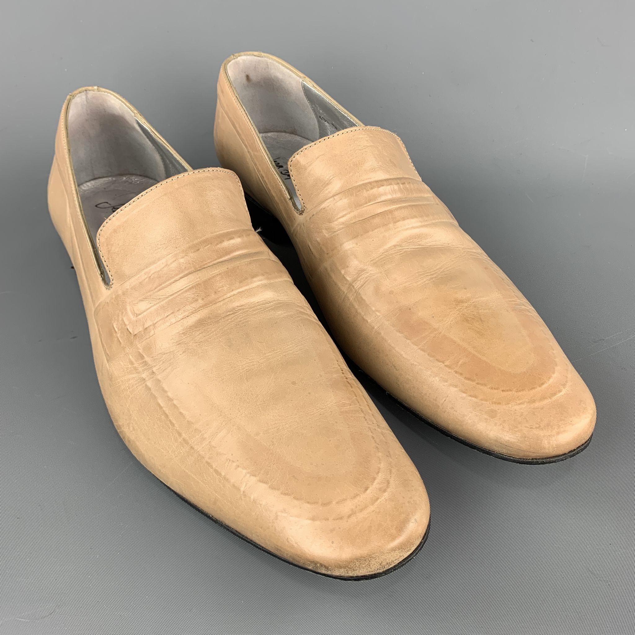 JEAN B. RAUTUREAU loafers comes in a natural leather featuring a slip on style, silver lining, and wooden heel. 
 
Excellent Pre-Owned Condition.
Marked: 43.5 

Outsole: 4 in. x 12 in. 

SKU: 98268
Category: Loafers

More Details
Brand: JEAN B.