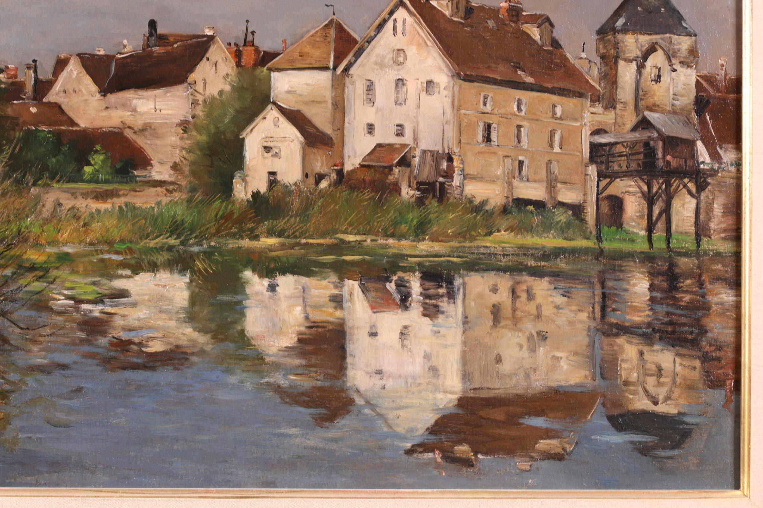 Signierte Öl auf Leinwand Landschaft circa 1890 von Französisch impressionistischen Maler Jean Baptiste Antoine Guillemet. Das Werk zeigt eine Ansicht von Moret-sur-Loing im Nordosten Frankreichs vom Ufer des Flusses Loing aus. Die Gebäude der Stadt