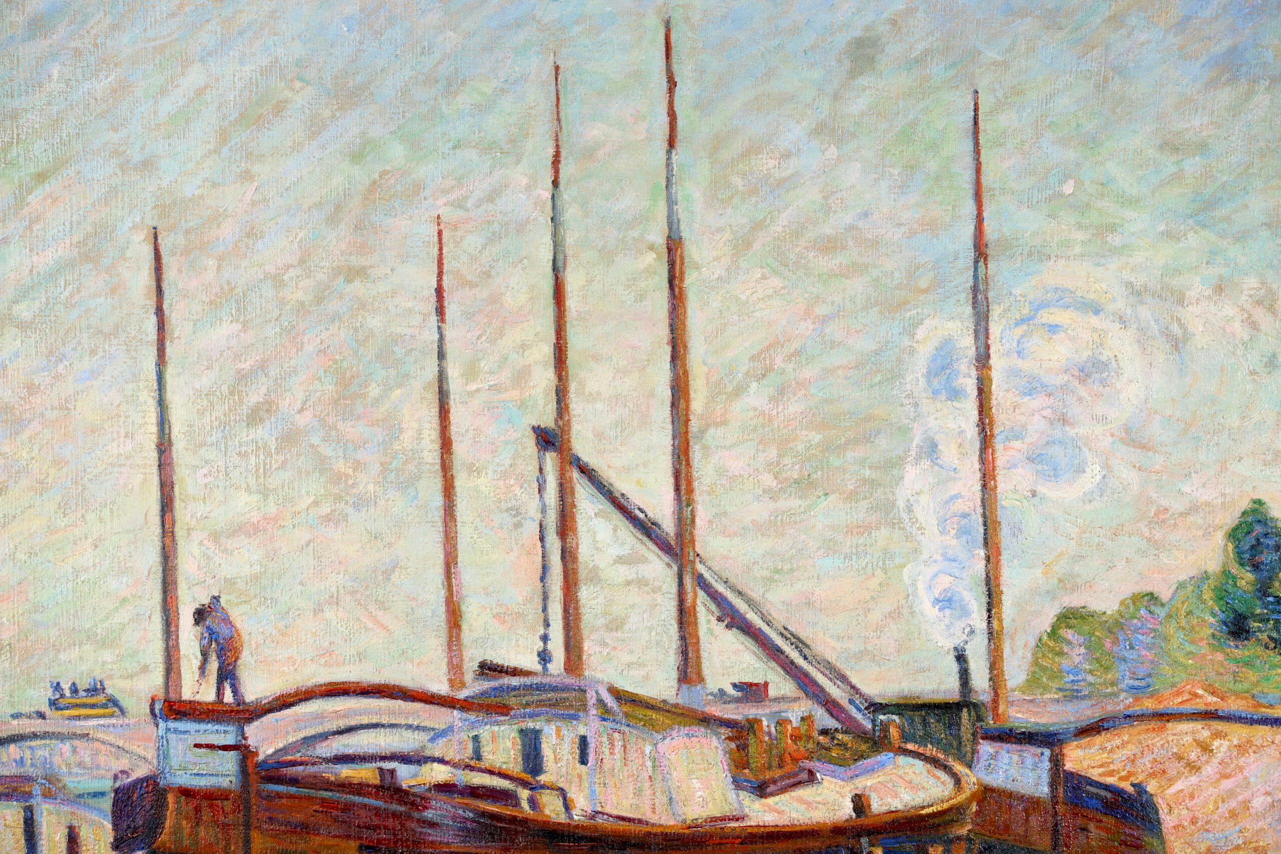 Signierte impressionistische Landschaft Öl auf Leinwand von Französisch Maler Jean Baptiste Armand Guillaumin. Das Werk zeigt Lastkähne, die am Ufer der Seine in Charenton vertäut sind, mit Blick auf eine Brücke im Hintergrund. 

Dieses große und