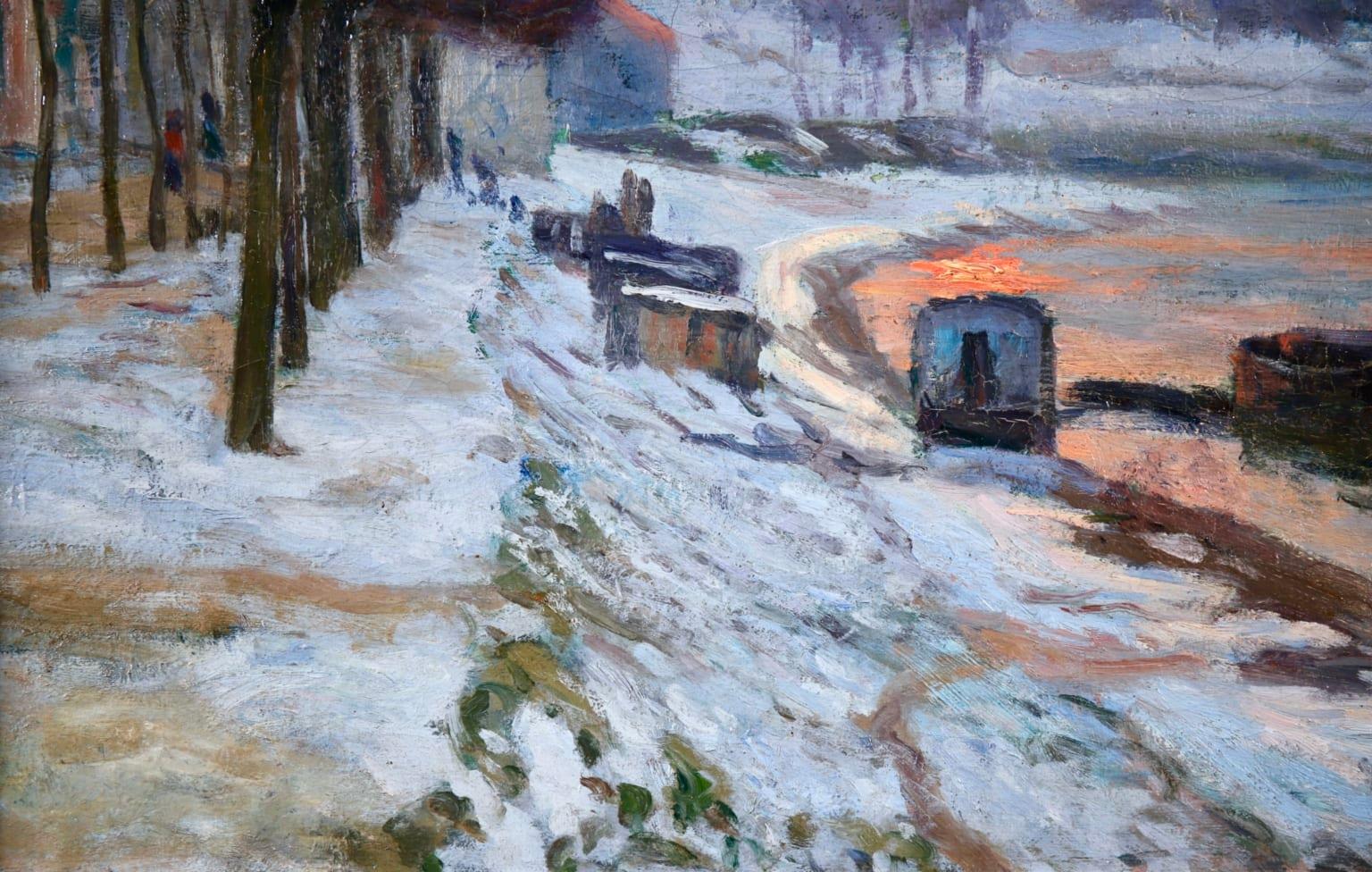 Impressionist oil on canvas riverscape circa 1875 by sought after French painter Jean Baptiste Armand Guillaumin. This stunning piece depicts boats moored at a snow covered quay on the River Seine, Paris. The winter sun is beautifully painted in