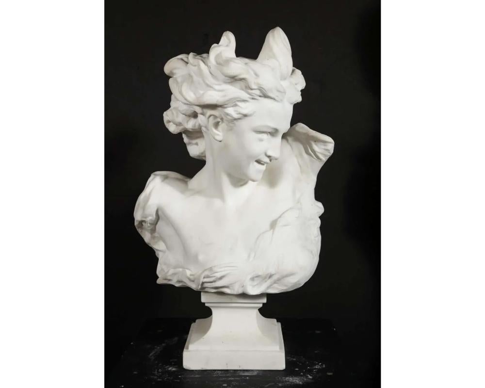 Jean-Baptiste Carpeaux (French, 1827–1875) white marble bust of “Genie De La Danse” (Spirit of the Dance), 19th century.
 
Carpeaux was a French sculptor and painter during the Second Empire under Napoleon III.
 
This bust from La Danse was the