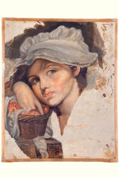 Giovane ragazza con un cesto di frutta