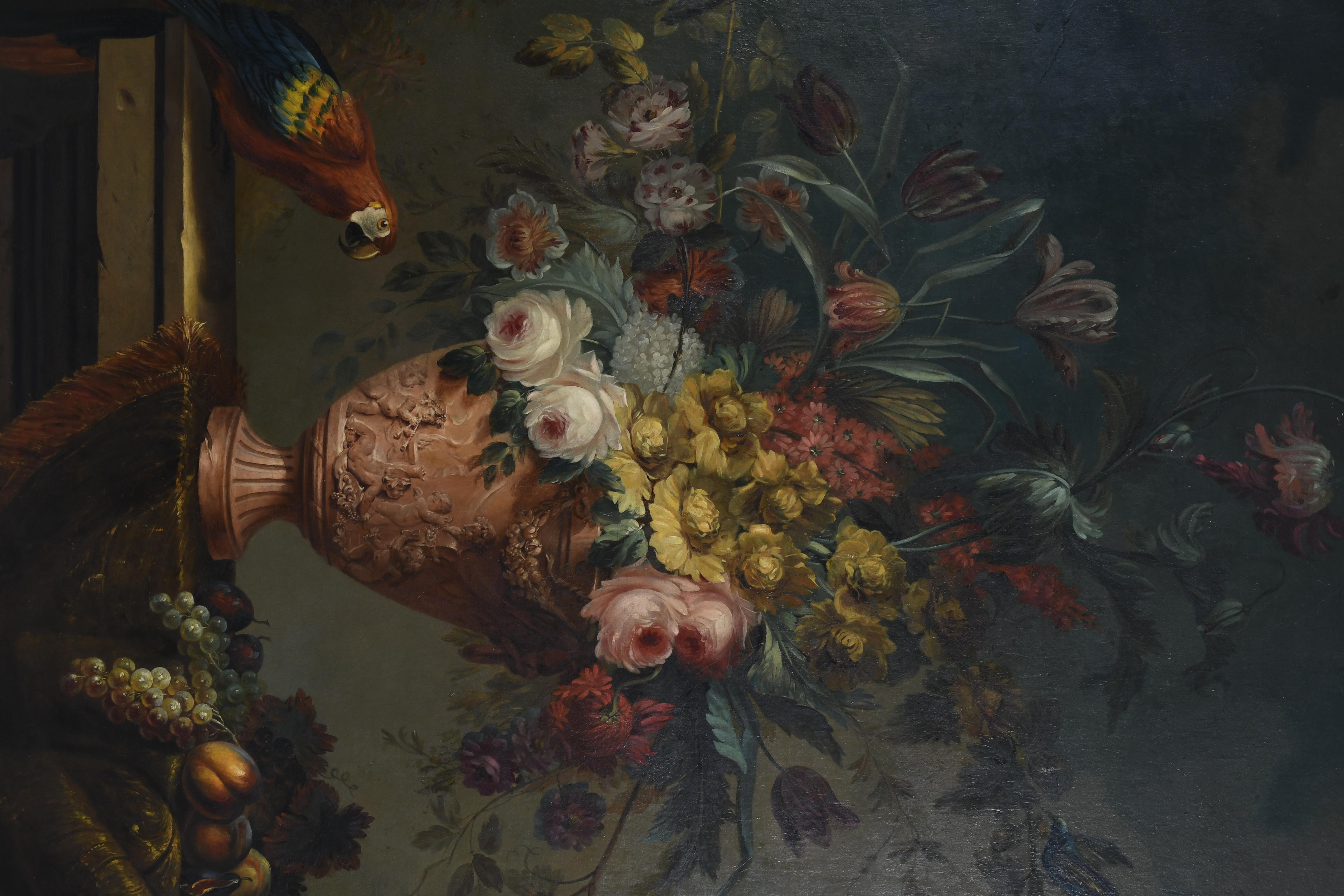 Opulent Still Life with Flowers, Fruit, Ornate Vase & Exotic Parrot on a Ledge - Painting by Jean-Baptiste Monnoyer