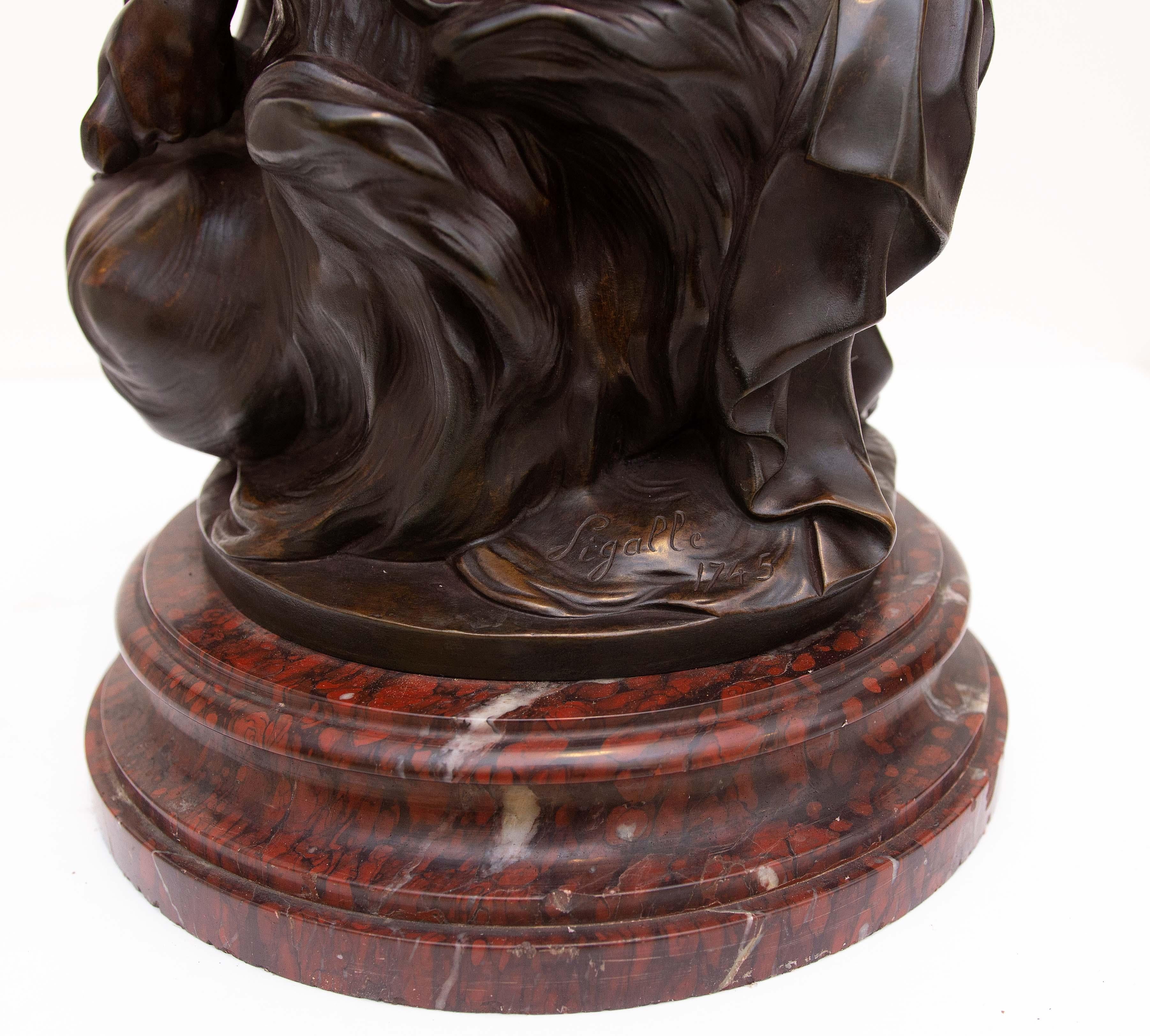 Sculpture en bronze patiné et marbre rouge représentant Hermès ou Mercure. XIXe siècle d'après Jean-Baptiste Pigalle. 