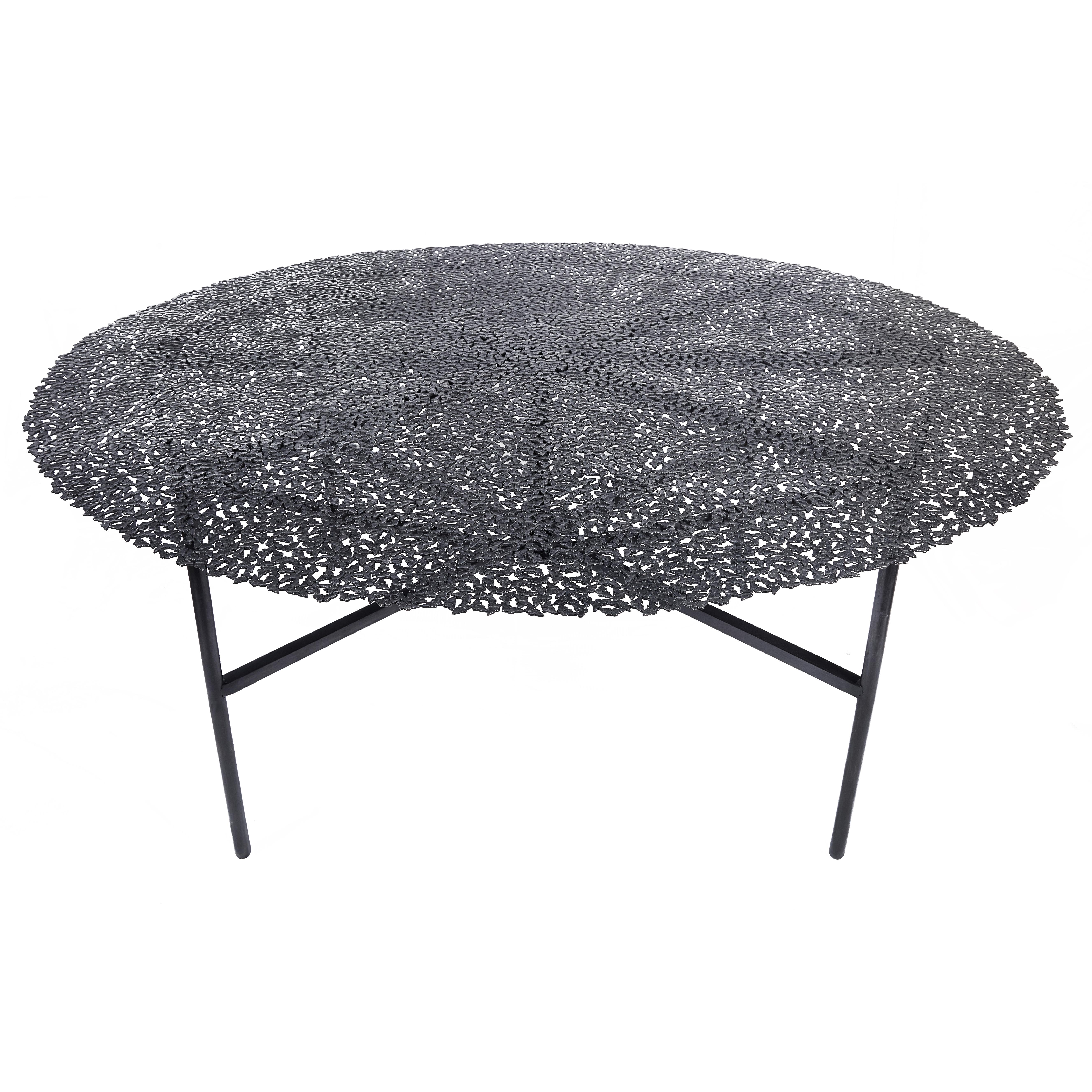 Jean Black Patina Bronze Dining Table by Fred and Juul
Dimensions: Ø 180 x H 74 cm.
Materials: Black patinated bronze.

Custom sizes, materials or finishes are available on request. Please contact us.

A swarm of butterflies as delicate as a lace