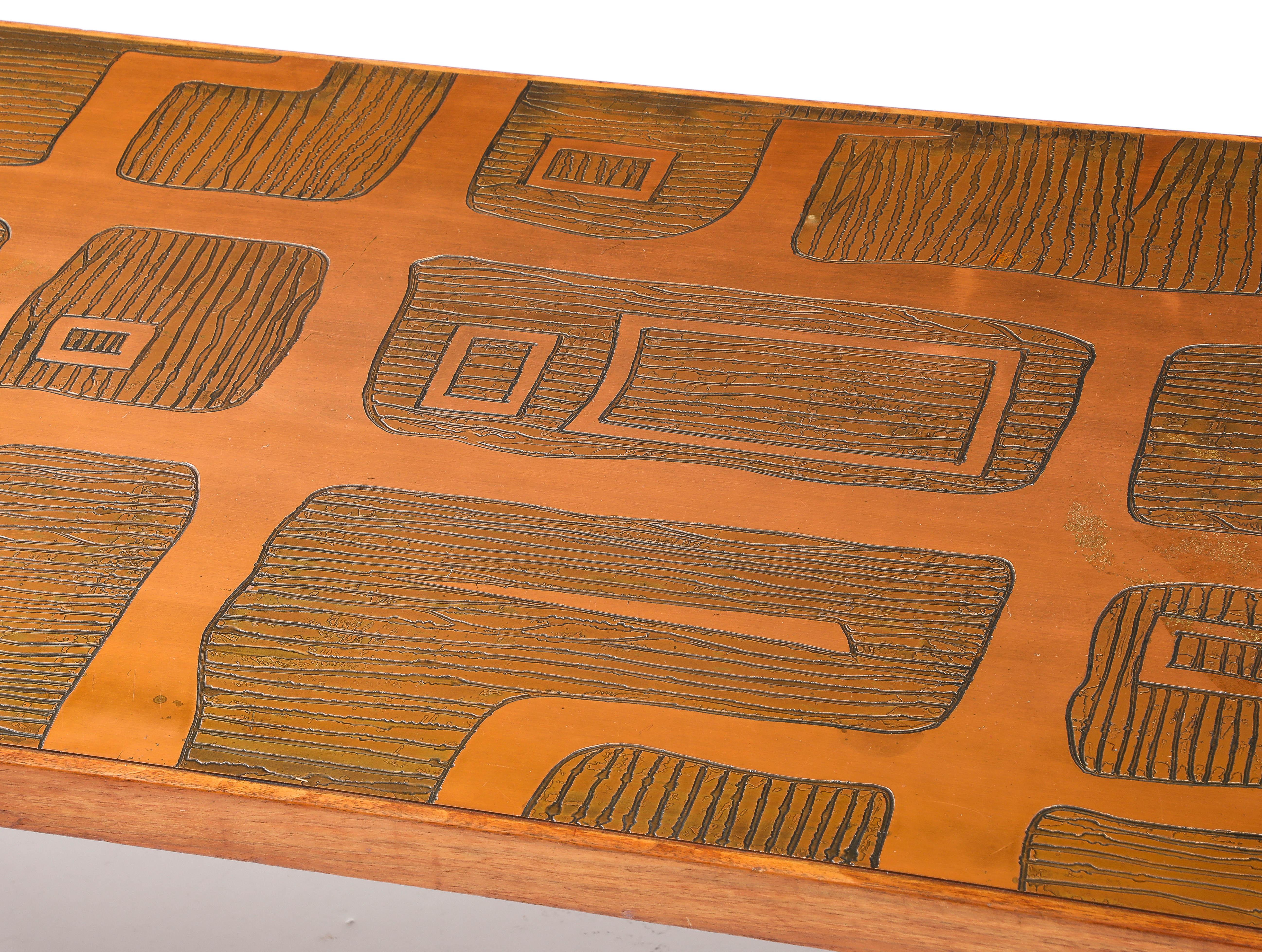 Large elm table with acid-etched copper top.