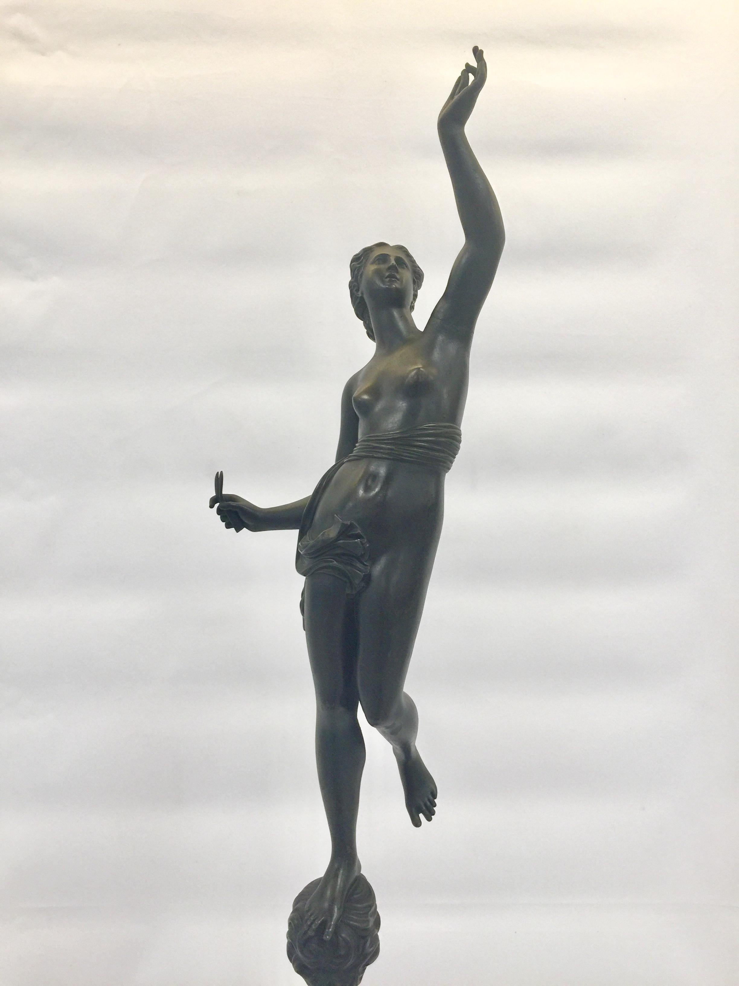 Incredible and big sculpture in bronze representing Dalila over black Portoro marble designed by Jean Bologna.