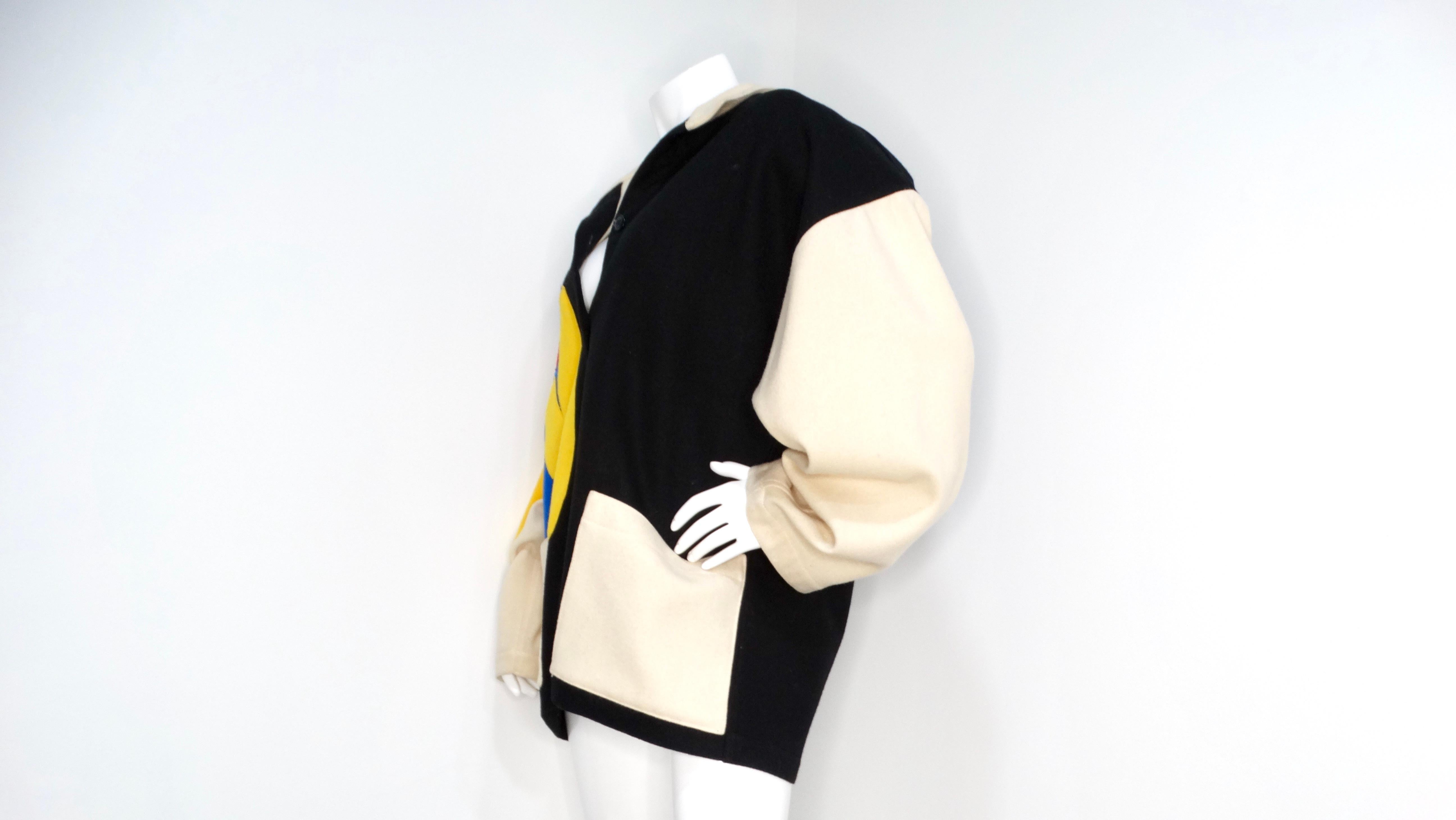 Arancia Jean-Charles De Castelbajac anni '80, giacca in lana con volto astratto in vendita