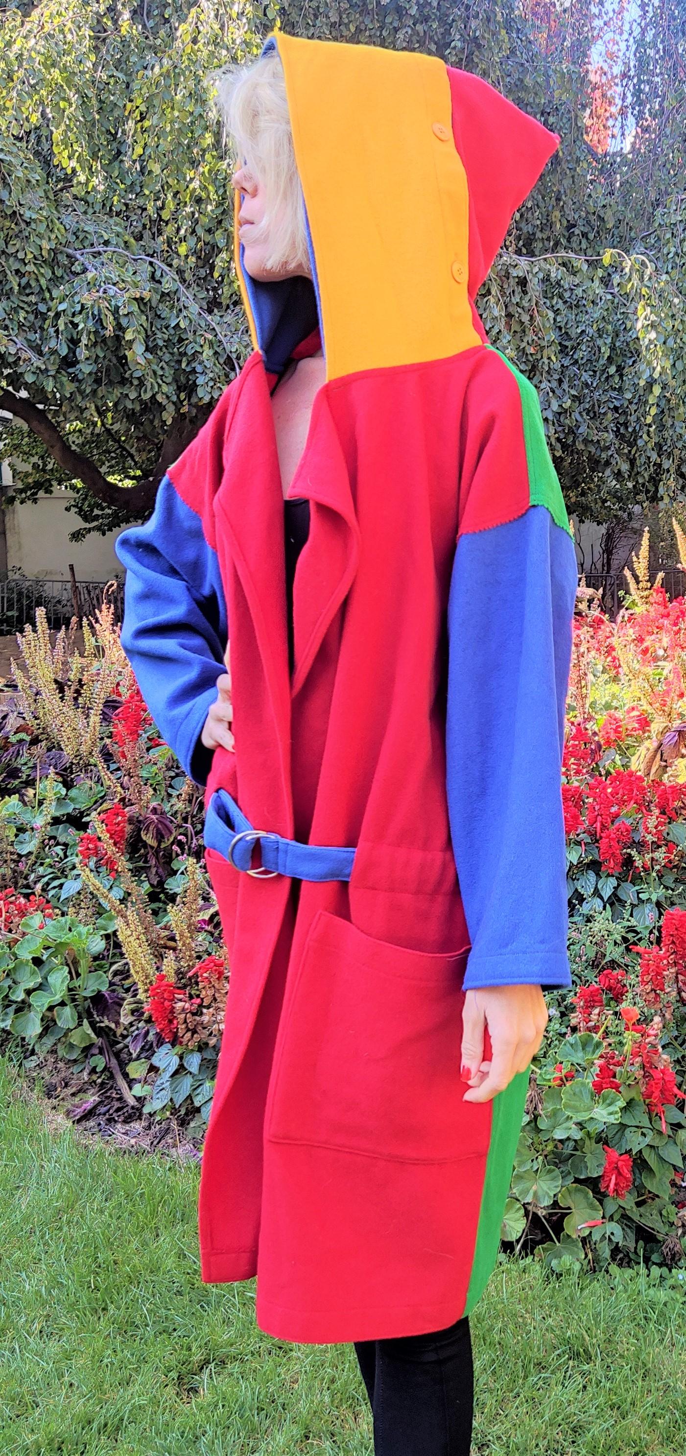 JC de Castelbajac color block coat with hood!
From the eraly Castelbajac`s years!
Wonderful colors!
Wool!
2 front pockets!

EXCELLENT CONDITION!

SIZE
One size. Please, read the measurements! Model`s size in the photos: XS. 
Woman: fits from XS to
