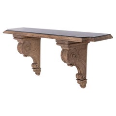Jean-Charles Moreux. Console in rovere intagliato e marmo. 1940s.