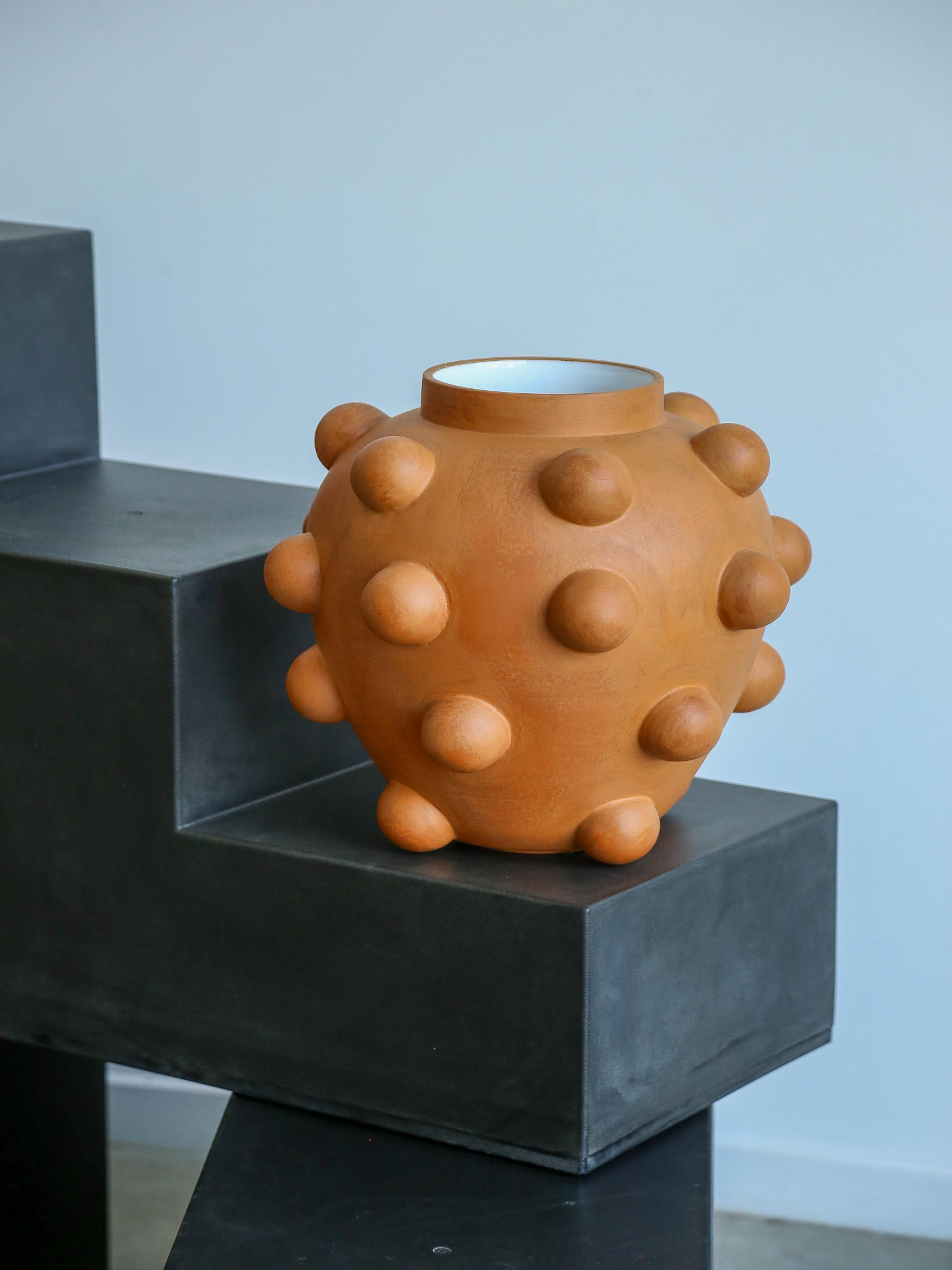 The different souls of nature resonate together. Clay vase, hand thrown with a glossy white glaze finish for the inside and waxed terracotta outside.

Jean Christophe Clair eagerly devoured every book and score, searched for interesting stimuli and