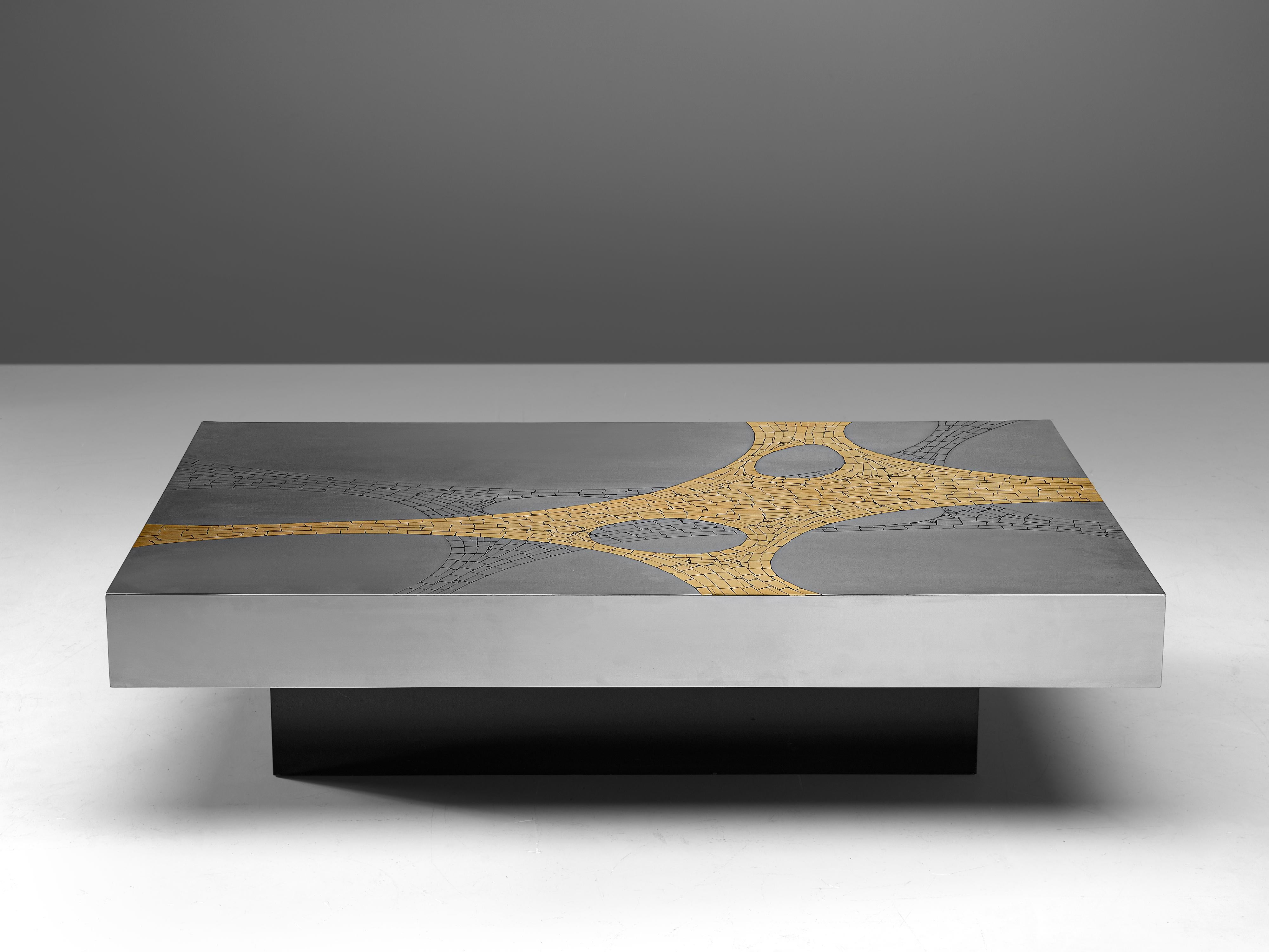 Jean Claude Dresse, coffee table, brushed stainless steel and brass, Belgium, circa 1970

An extraordinary piece, crafted with great eye for proportions and detail, typical for the work of Dresse. The combination of materials, steel, brass have a