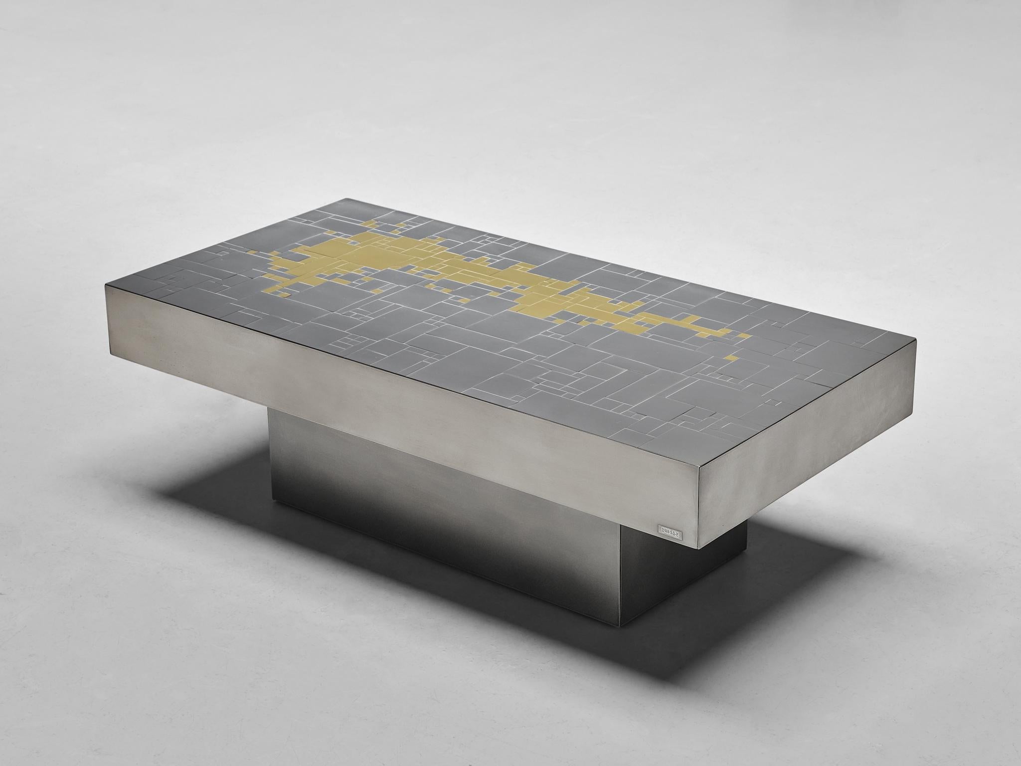 Jean Claude Dresse, coffee table, brass, brushed steel, Belgium, 1970s

Rectangular coffee table with striking tabletop designed by Jean Clause Dresse in the 1970s. Dresse is known for his bold designs, this table is no exception. The surface is