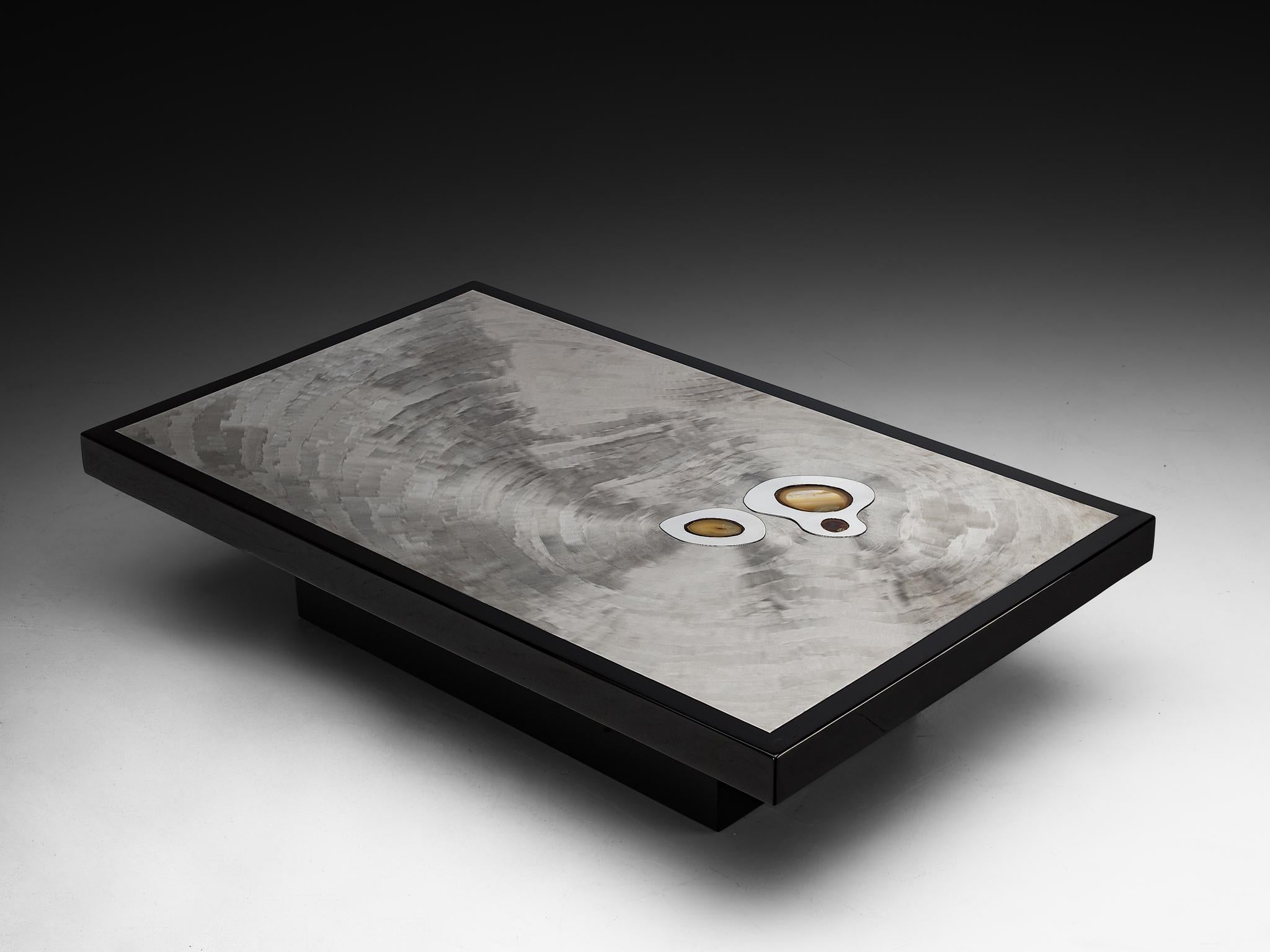 Jean Claude Dresse, coffee table, stainless steel, agate, resin, wood, Belgium, 1970s

This striking coffee table by Belgian artist-designer Jean Claude Dresse is a masterwork of 1970s design, seamlessly merging sculptural form with fine