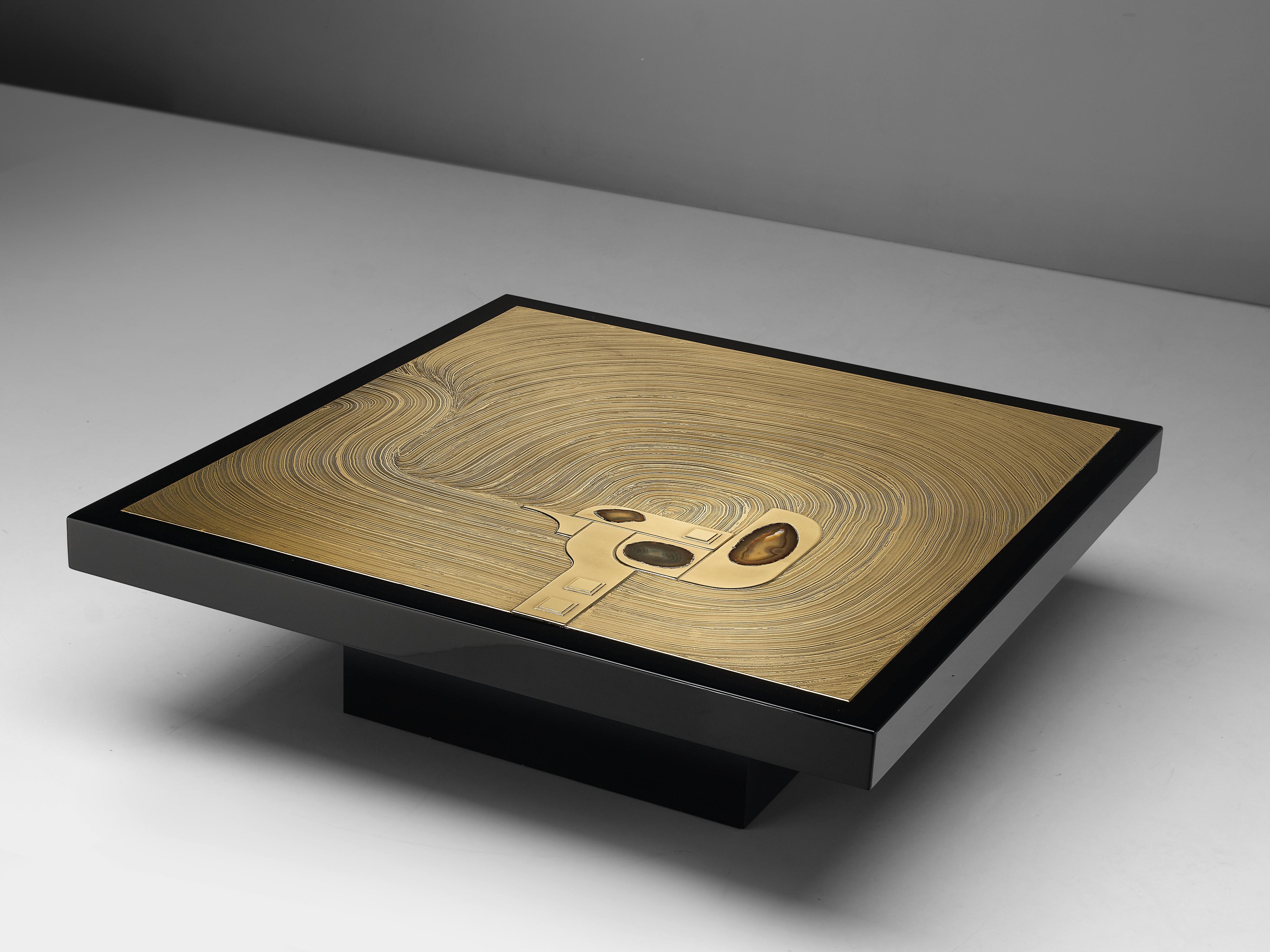 Jean Claude Dresse, coffee table, brass, steel and agate, Belgium, circa 1970.

A luxurious square cocktail table, crafted with high attention for detail which is characteristic for the work of the Belgian artist Jean Claude Dresse. The piece is