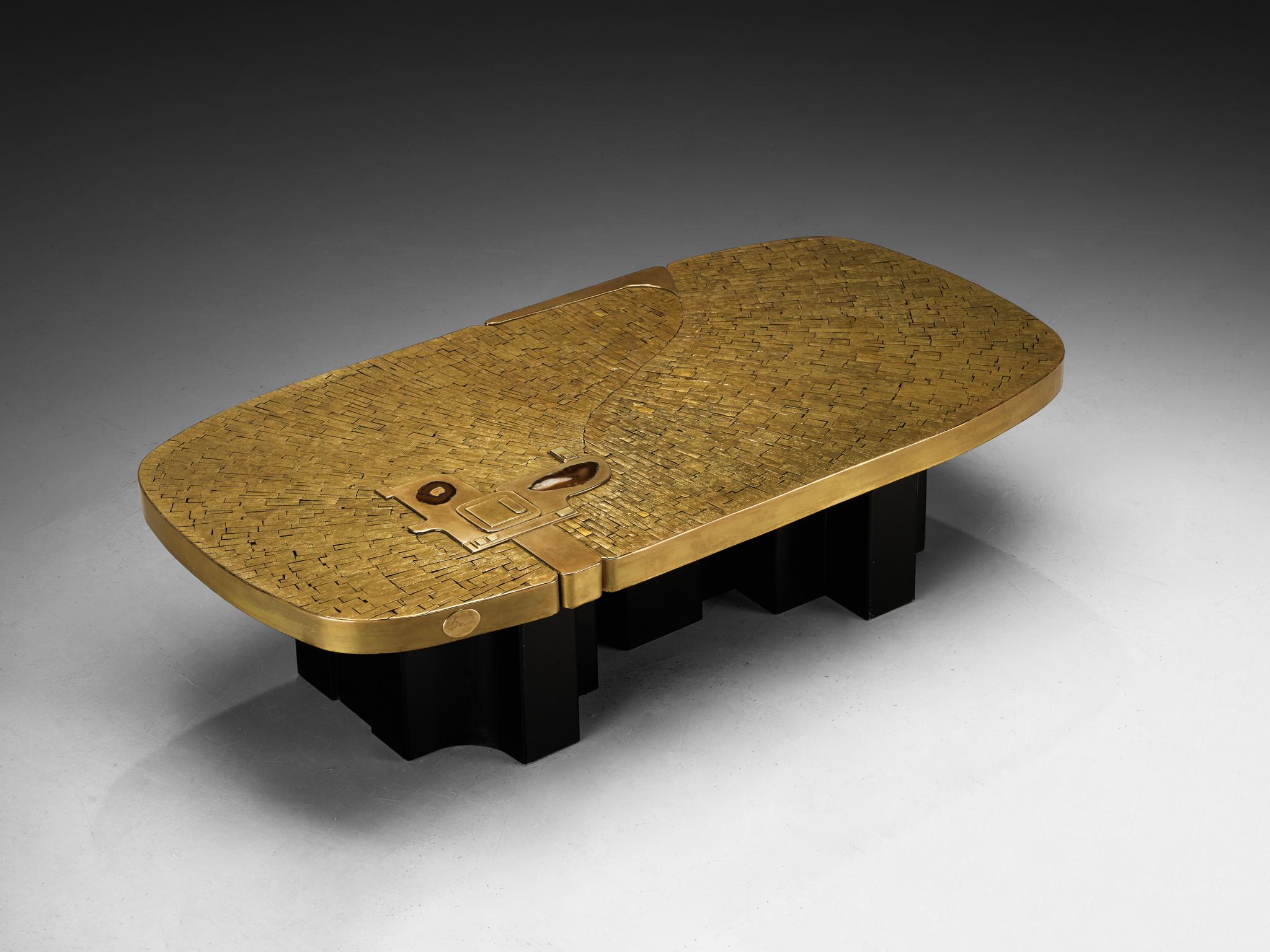 Jean Claude Dresse, coffee table, brass, lacquered steel, agate, Belgium, 1970s

Enchanting coffee table designed by Belgian artist Jean Claude Dresse in the 1970s. This rectangular table in brass with rounded contours is easily recognizable as a