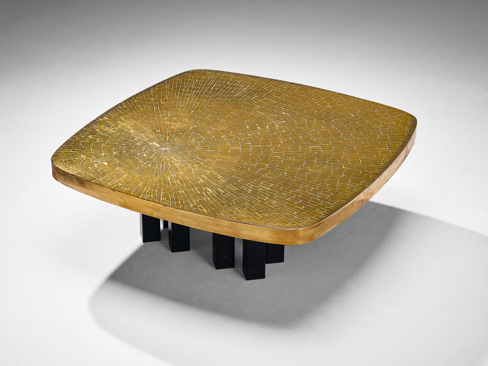 Jean Claude Dresse, coffee table, brass and steel, Belgium, 1970s

Enchanting coffee table designed by Belgian artist Jean Claude Dresse in the 1970s. This square table with rounded edges is easily recognizable as a design of Dresse, displaying high