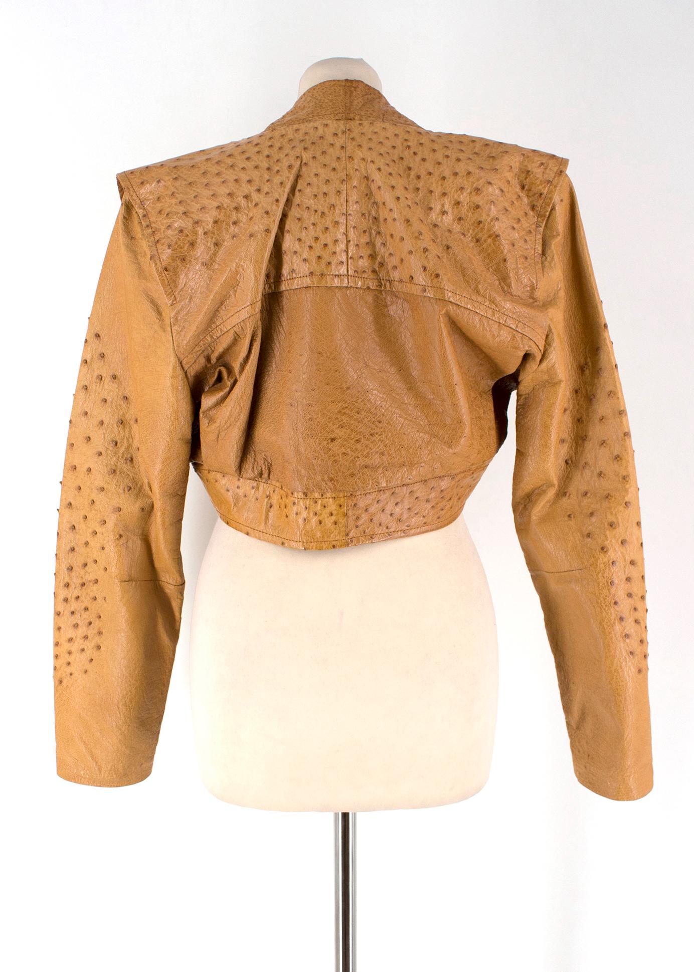 Jean Claude Jitois Tan Ostrich Jacket
Please see matching skirt 
 
- Cropped ostrich leather jacket
- Two illusion front pockets
- Rounded hemline

-There is a matching skirt available

Please note, these items are pre-owned and may show signs of