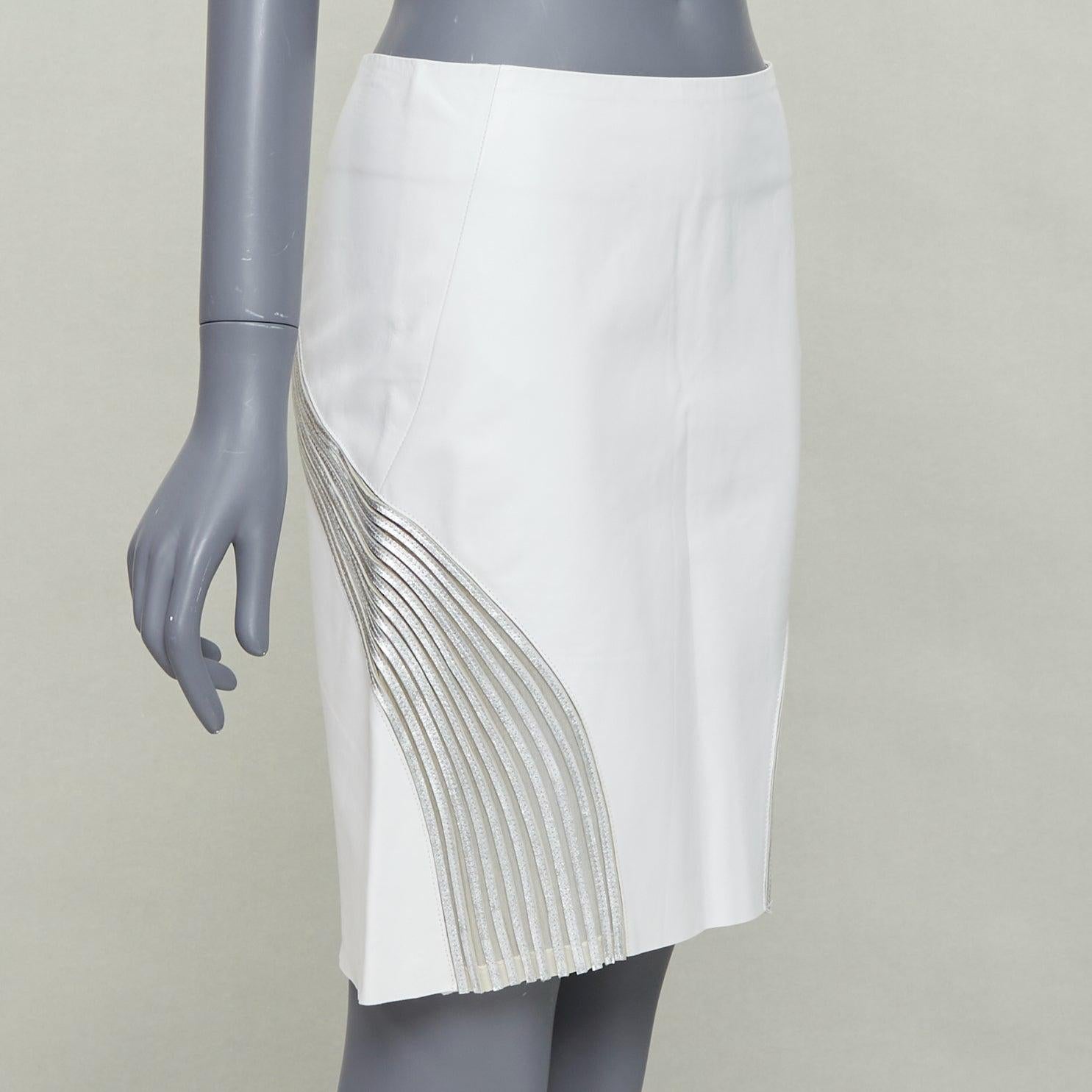 JEAN CLAUDE JITROIS white  leather silver silk applique pencil skirt IT36 XXS
Reference: CC/A00421
Brand: Jitrois
Material: Leather, Fabric
Color: White, Silver
Pattern: Solid
Closure: Zip
Extra Details: Silver leather with silk blend fabric