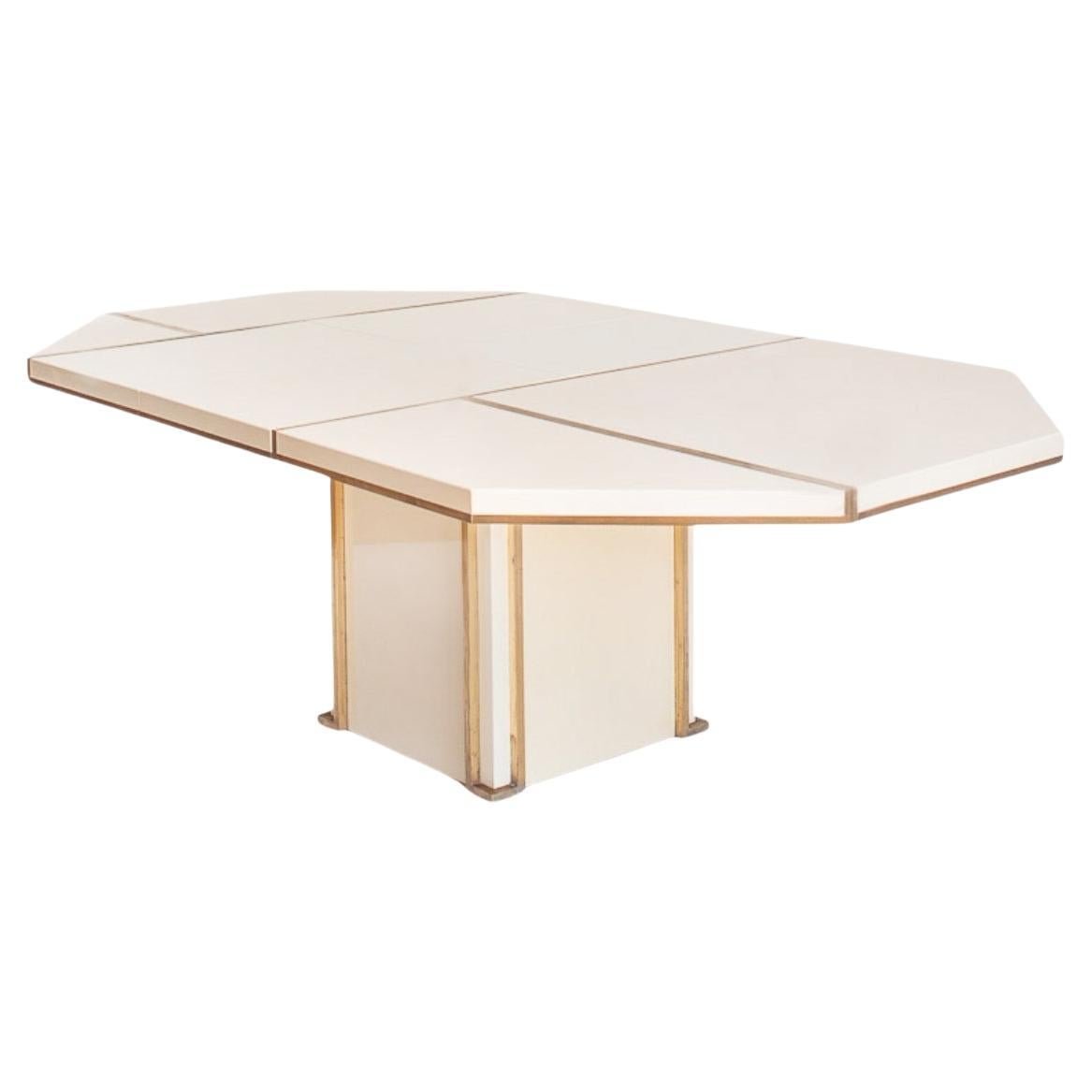 
One of a kind and  exquisite table clearly embodies the spirit of high-end French design from the 1970s and 1980s, characteristic of Jean-Claude Mahey. Its precise geometry and lacquer finish evoke an aesthetic that fuses Art Deco, reinterpreted