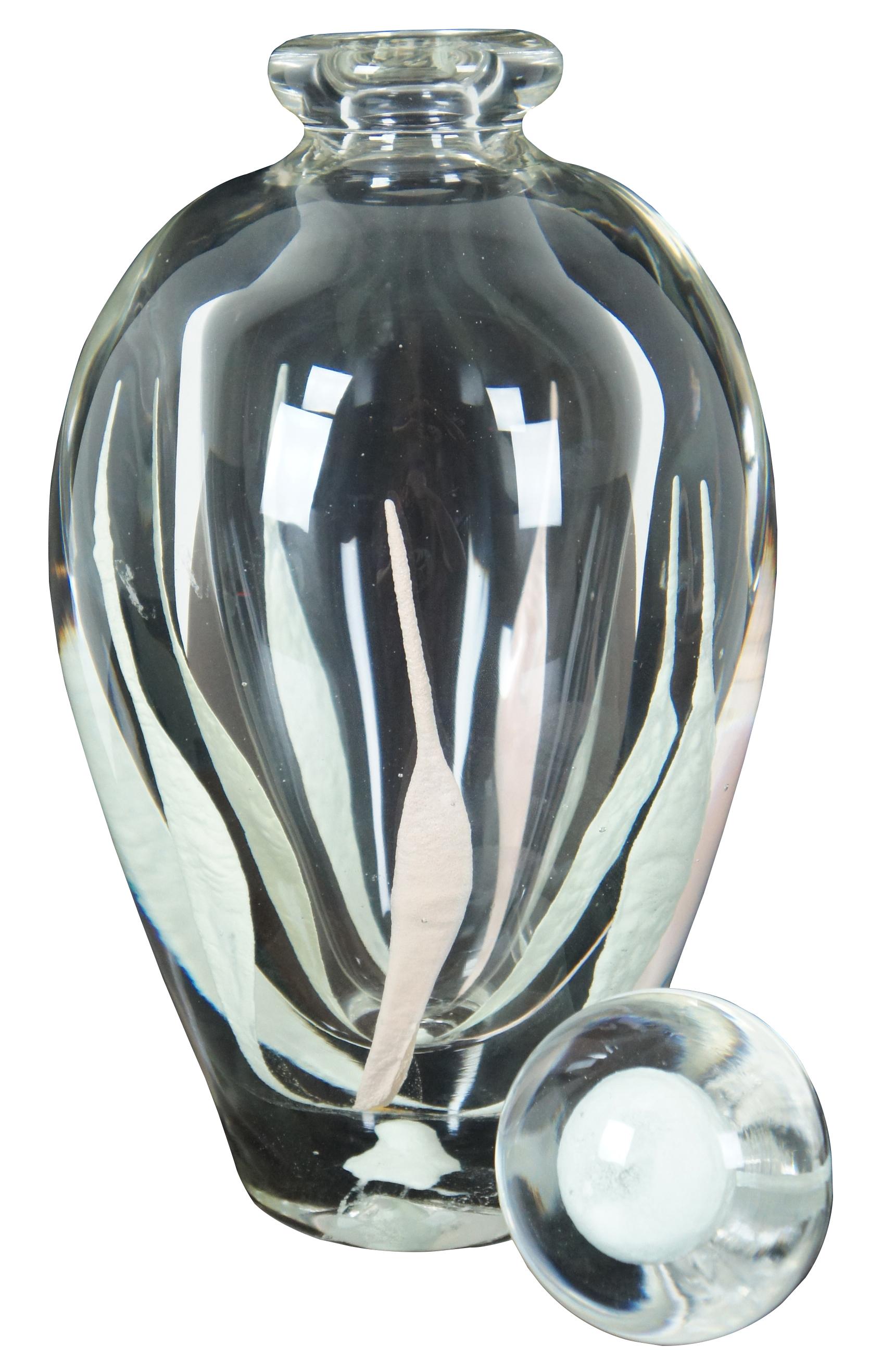 Glow in the dark purfume bottle or vase by JCN. 1943– Born in Antibes, France in 1943, Jean Claude Novaro is a world-renowned glassblower. His works, once small animals being sold to tourists, are now in galleries, museums, and private collections