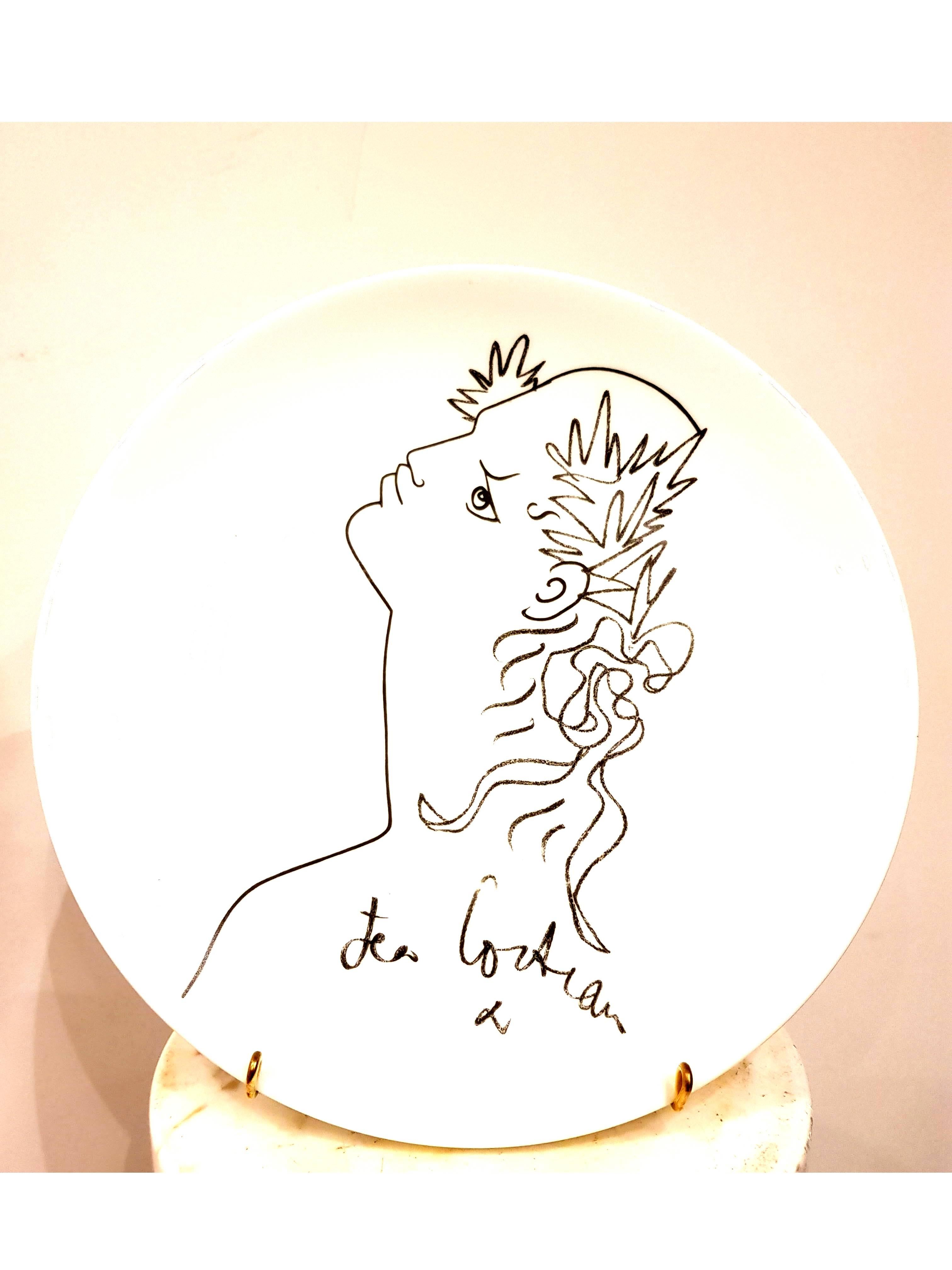  Original Limoges Porcelain Plate
Title: Profile
Signed in the plate
Dimensions: Diameter: 26 cm
Edition: 35/250 
Edited by Seta-Aubusson. 

Jean Cocteau

Writer, artist and film director Jean Cocteau was one of the most influential creative figures