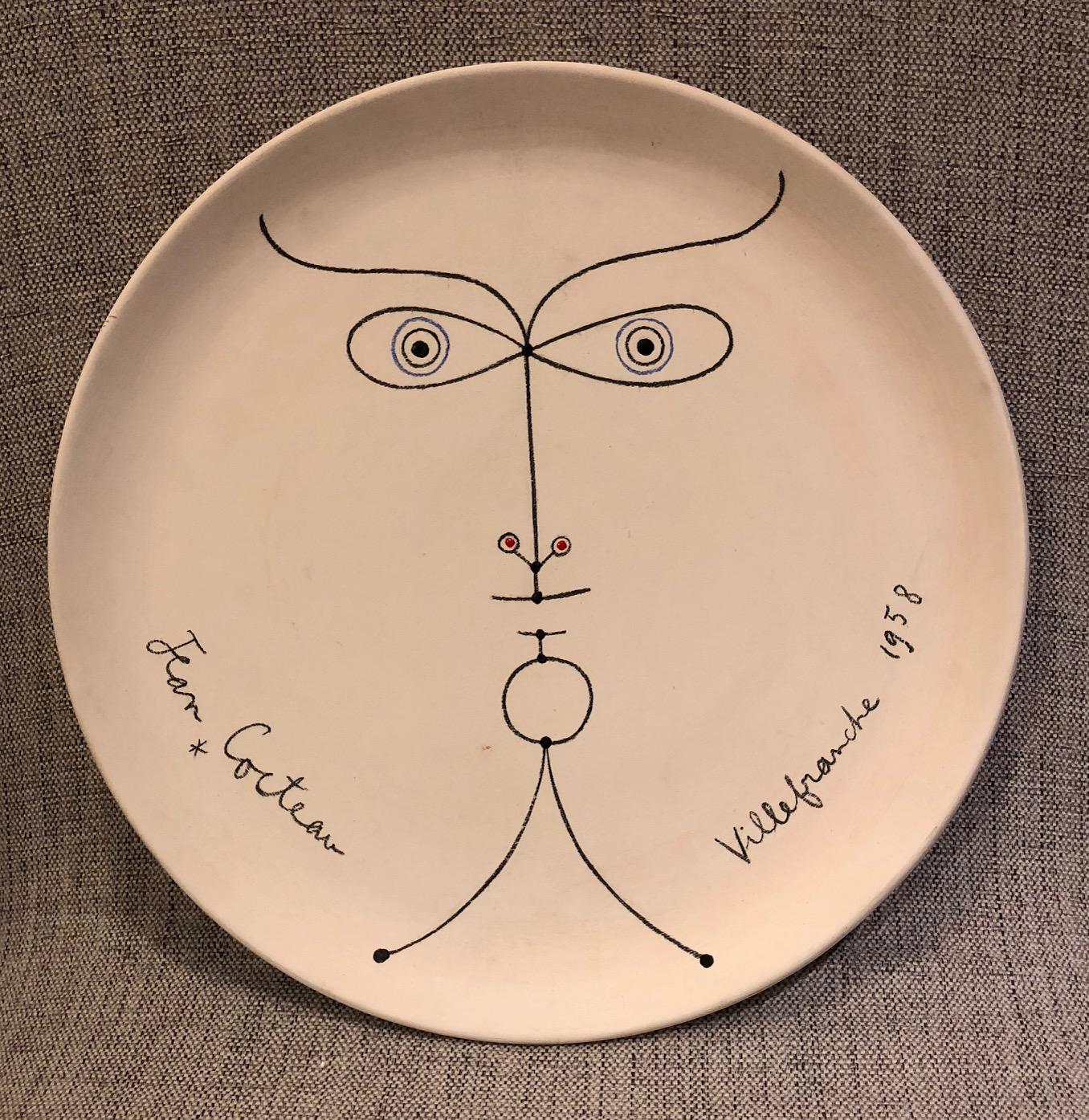 Jean Cocteau ceramic dish - La Joconde- 1958

Edition originale Atelier Madeline & Jolly with certificat d'origine dated et signed .

White earthenware with black / red / blue enamel, measure: Diameter 30 cm.

Numbered 35 on 50 copies