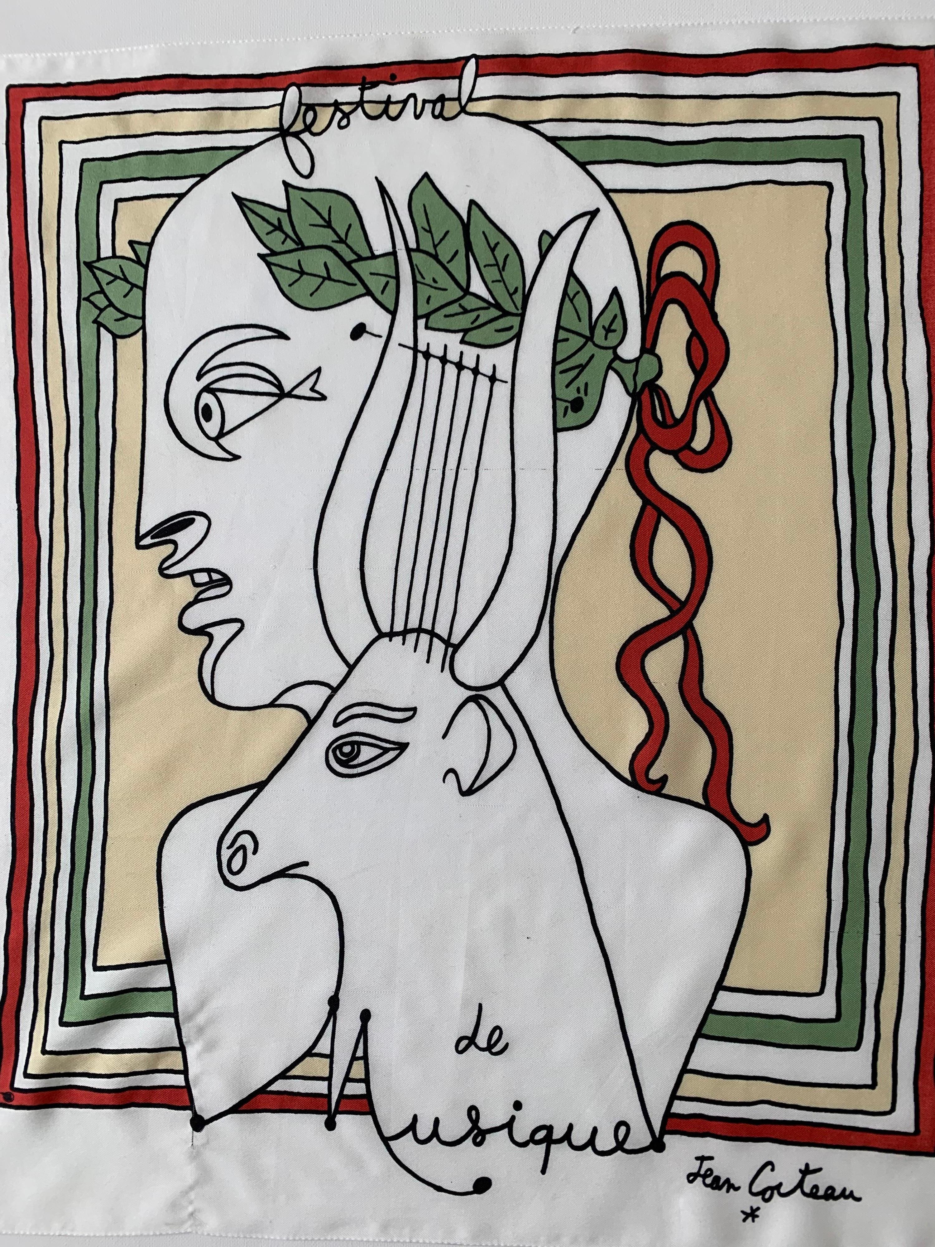Collectible scarf by the artist Jean Cocteau. Features a profile of a head with the symbolic of a harp and an ox 