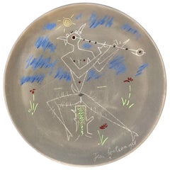 Plat en poterie terre cuite Jean Cocteau, Faune Musicien 'Face', signé et daté