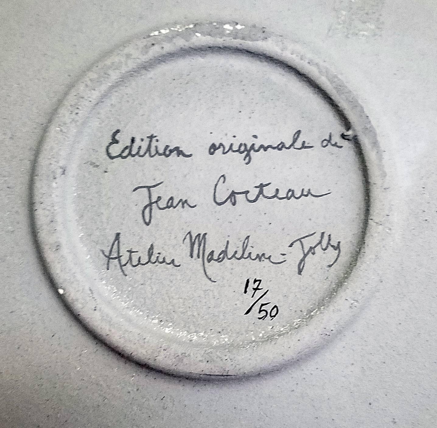Jean Cocteau terracotta pottery dish,
Danseuse et Musiciens,
Signed and dated by Jean Cocteau 1958
Number 17 of an Edition of 50.

Jean Cocteau ceramic dish with grey engobe, oxide crayon and coloured glaze and painted with three stylized Greek
