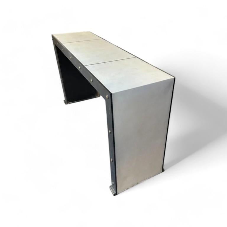 Jean De Merry Axel Console in size Large in Parchment with Light Bronze Frame with Bronze Accents and Inlays.

Description
Large / W61″ x D18″ x H33″

Check our storefront for Jean De Merry Axel Console Small in Oak.

Jean de Merry was established