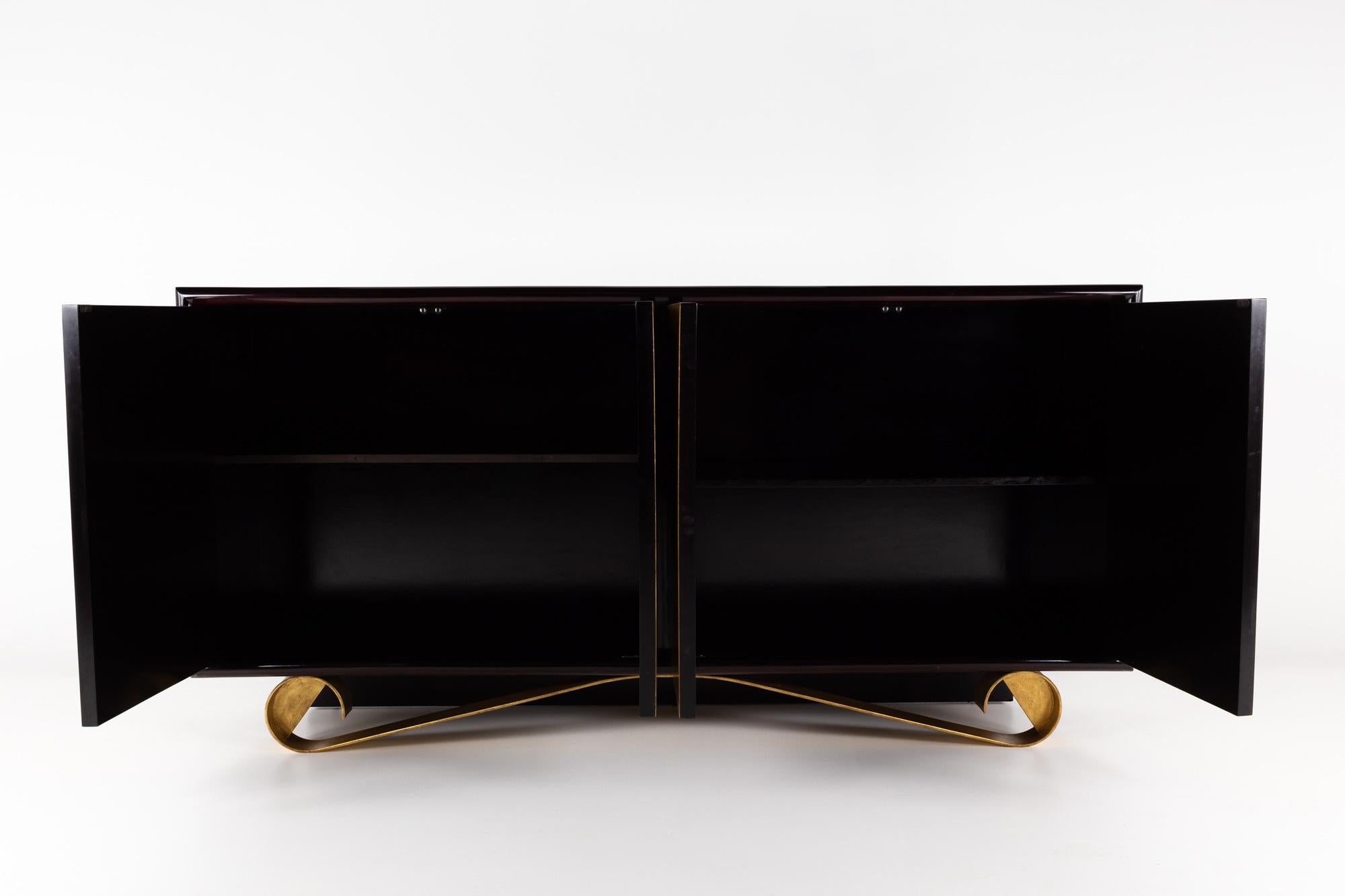 Jean de Merry contemporary cassetto sideboard

This sideboard measures: 78 wide x 17 deep x 39 inches high

This piece is in great vintage condition - although there is some residue on the far left doors and the front sits a bit lower than the