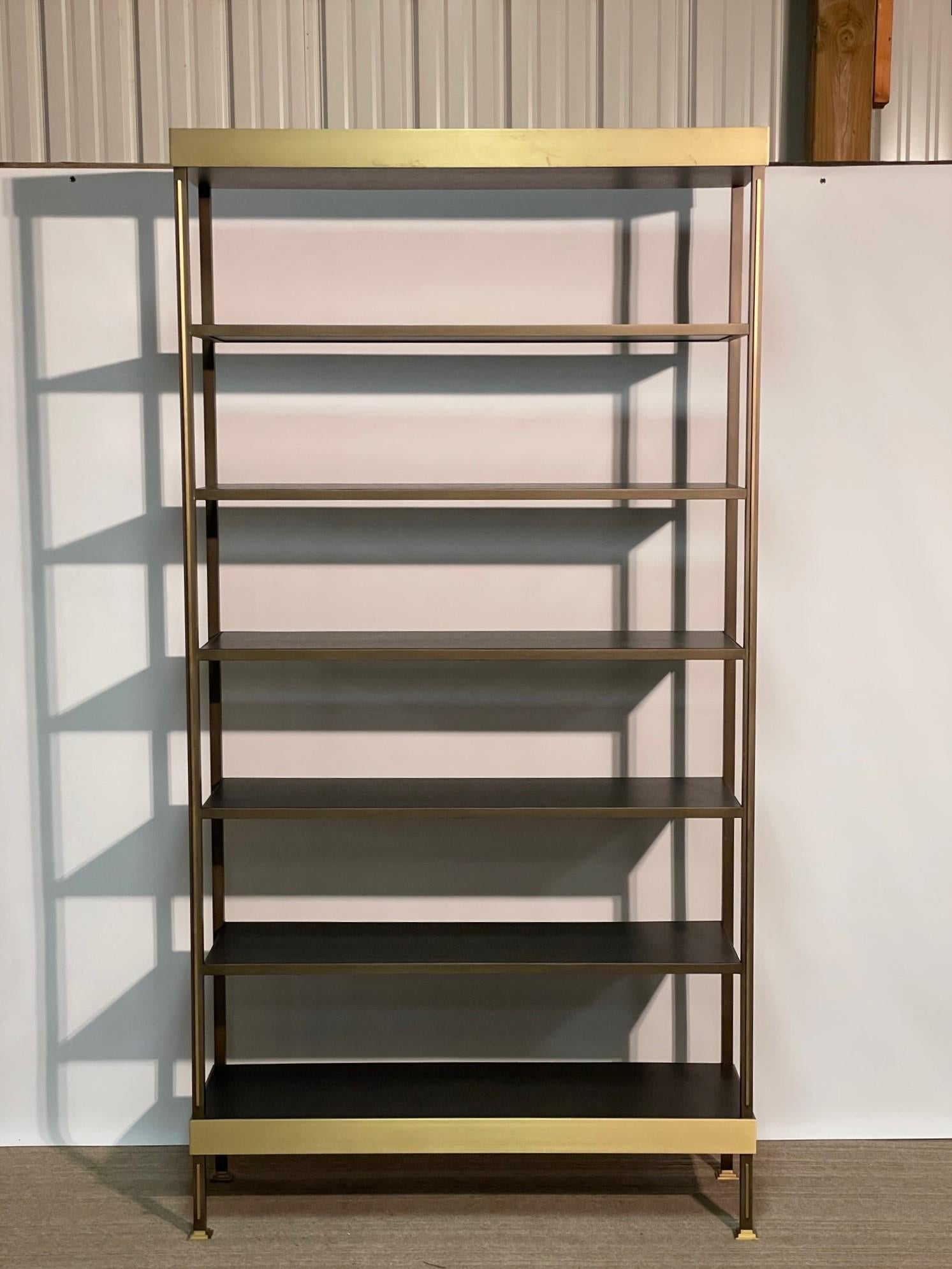 Substantial and Impressive are words that come to mind when viewing the Prate bookshelf by Jean de Merry.  The Metal frame finishing in Old Silver with the Bronze accents finished in Light Bronze convey body weight and strength to this formidable