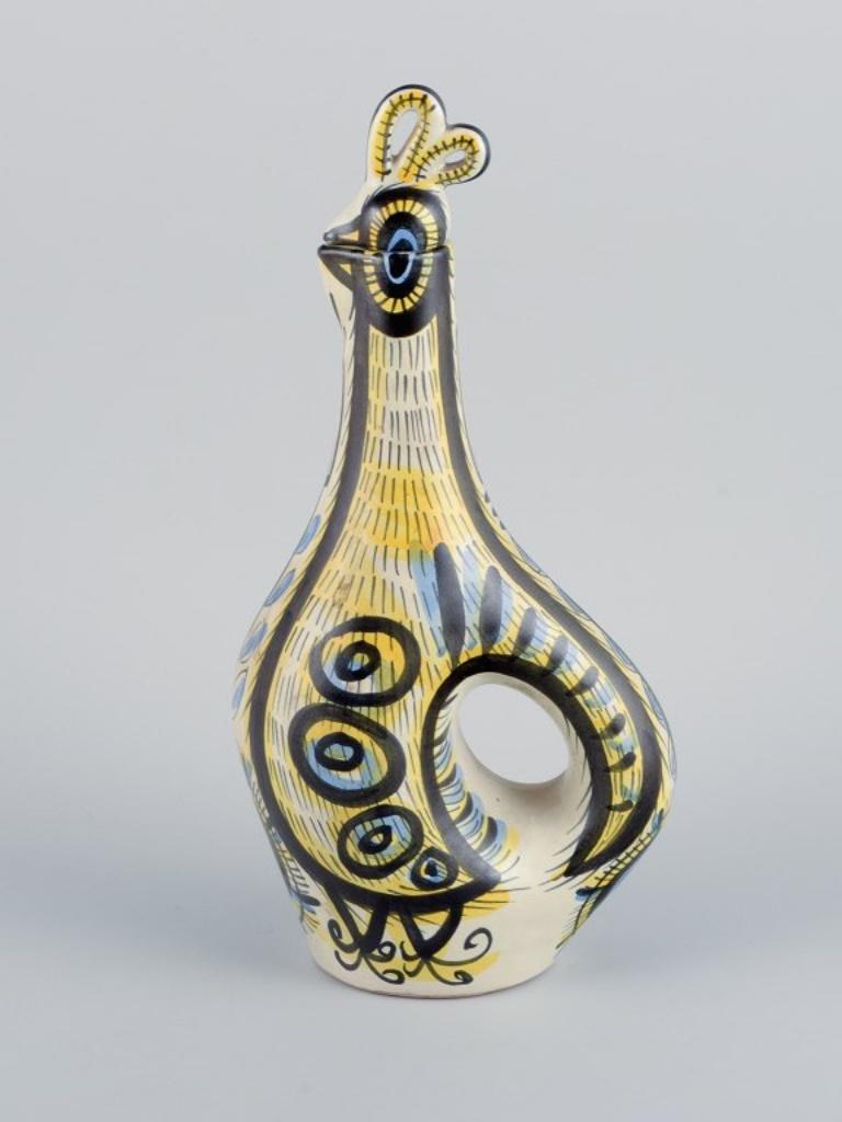Mid-Century Modern Jean Delima for Keraluc, Quimper, France, a pair of large faience pitchers.