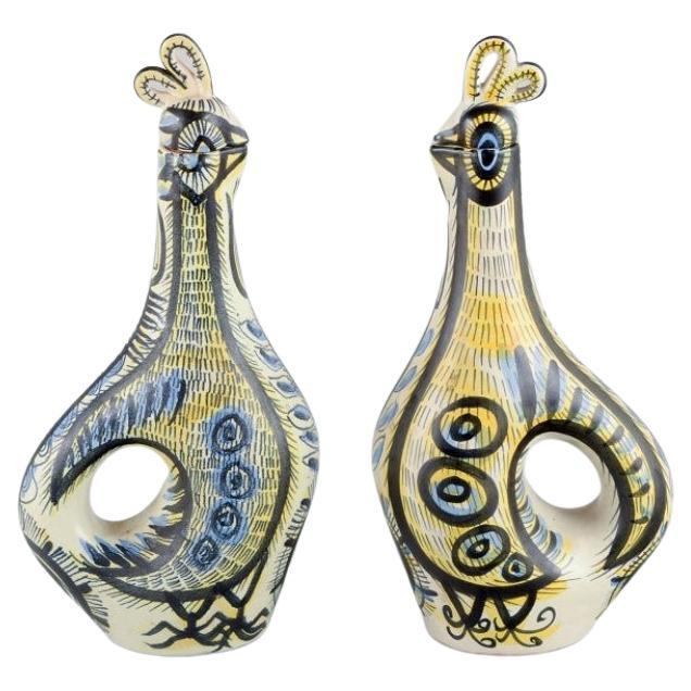 Jean Delima for Keraluc, Quimper, France, a pair of large faience pitchers. For Sale