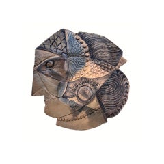 Plat en céramique, visage de femme