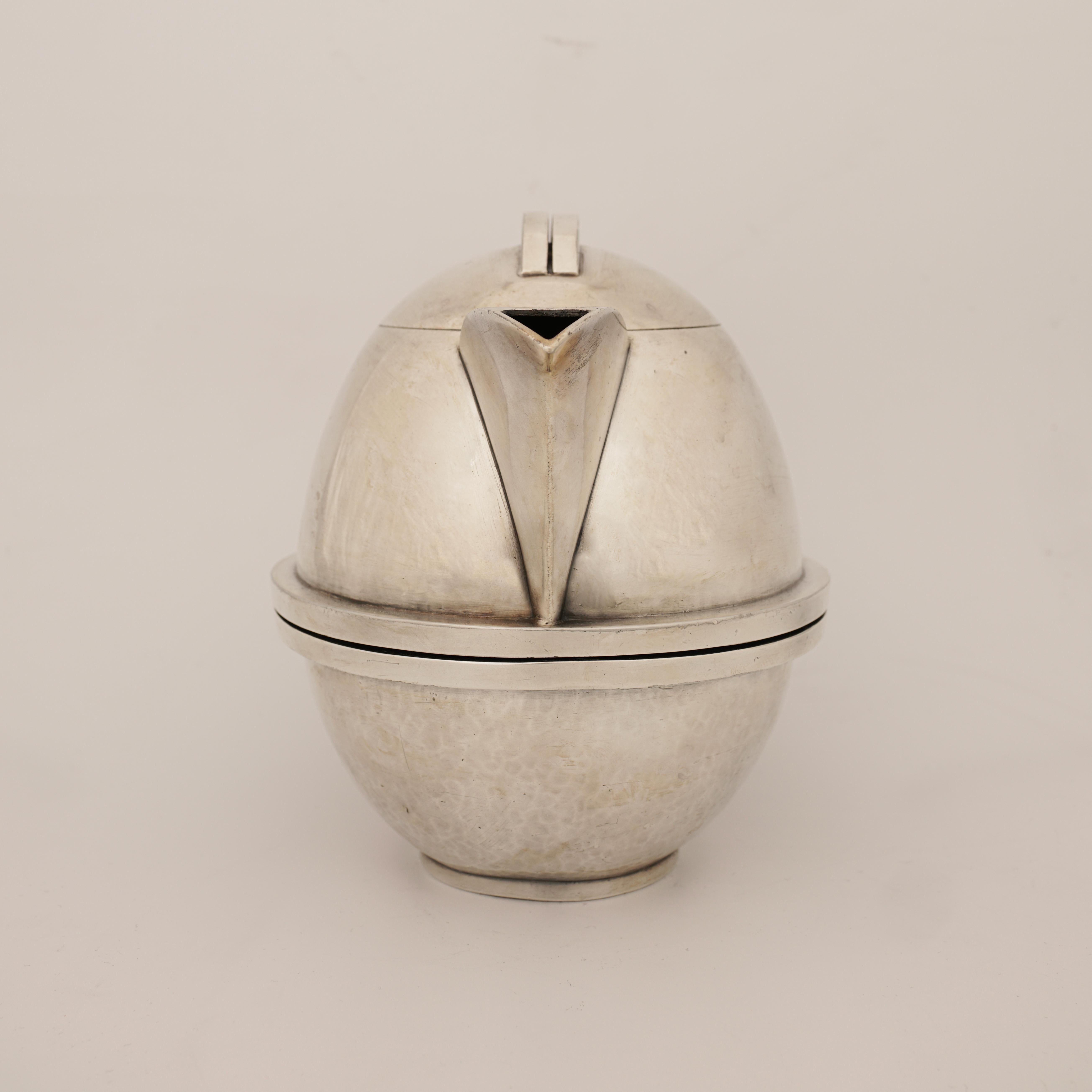 Modern Jean Després, a Rare Tin and Madagascar Ebony Wood Tea-Pot, circa 1930