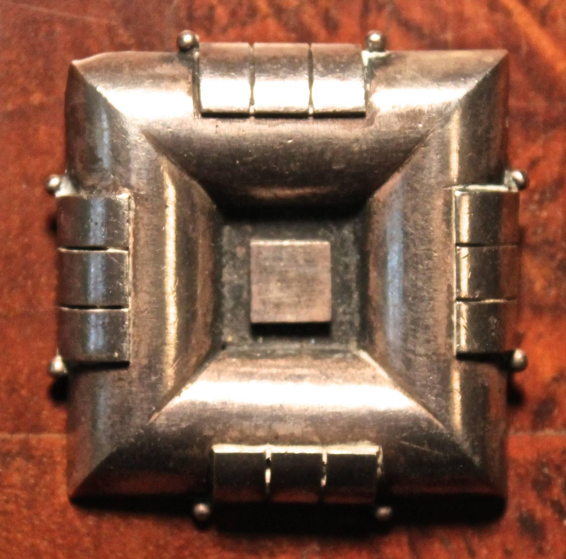 A beautiful, 1930s Jean Despres (1889-1980) deco silver brooch inspired by modern Industrial forms. Signed.